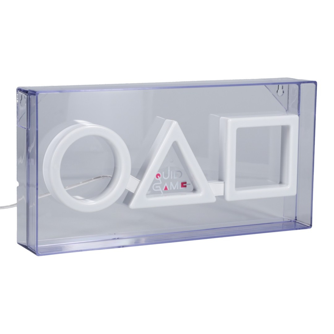 Białe światło z symbolem Squid Game, z kształtami koła, trójkąta i kwadratu w przezroczystym pudełku.