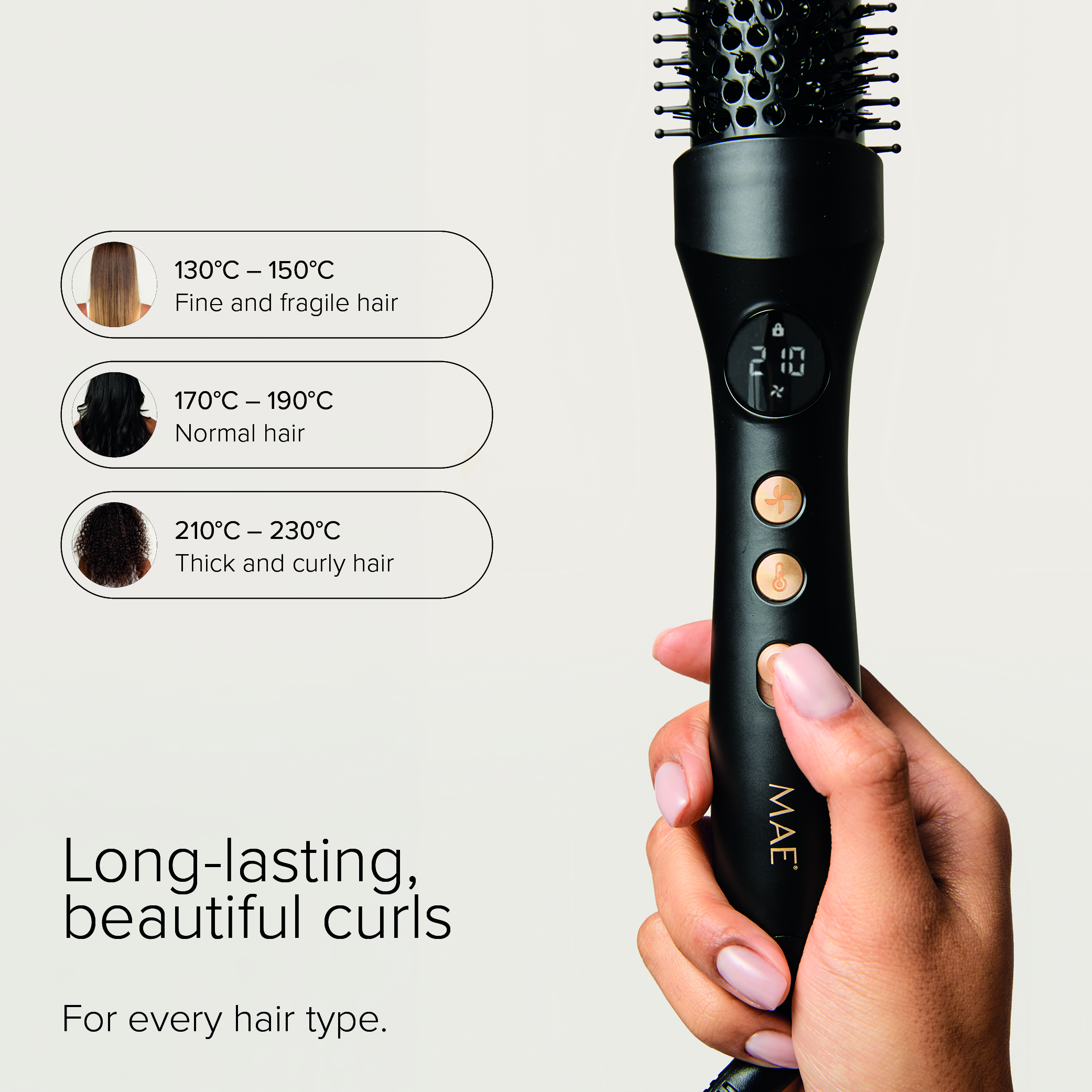 Bigoudi noir MAE tenu à la main, affichant les réglages de température pour différents types de cheveux.