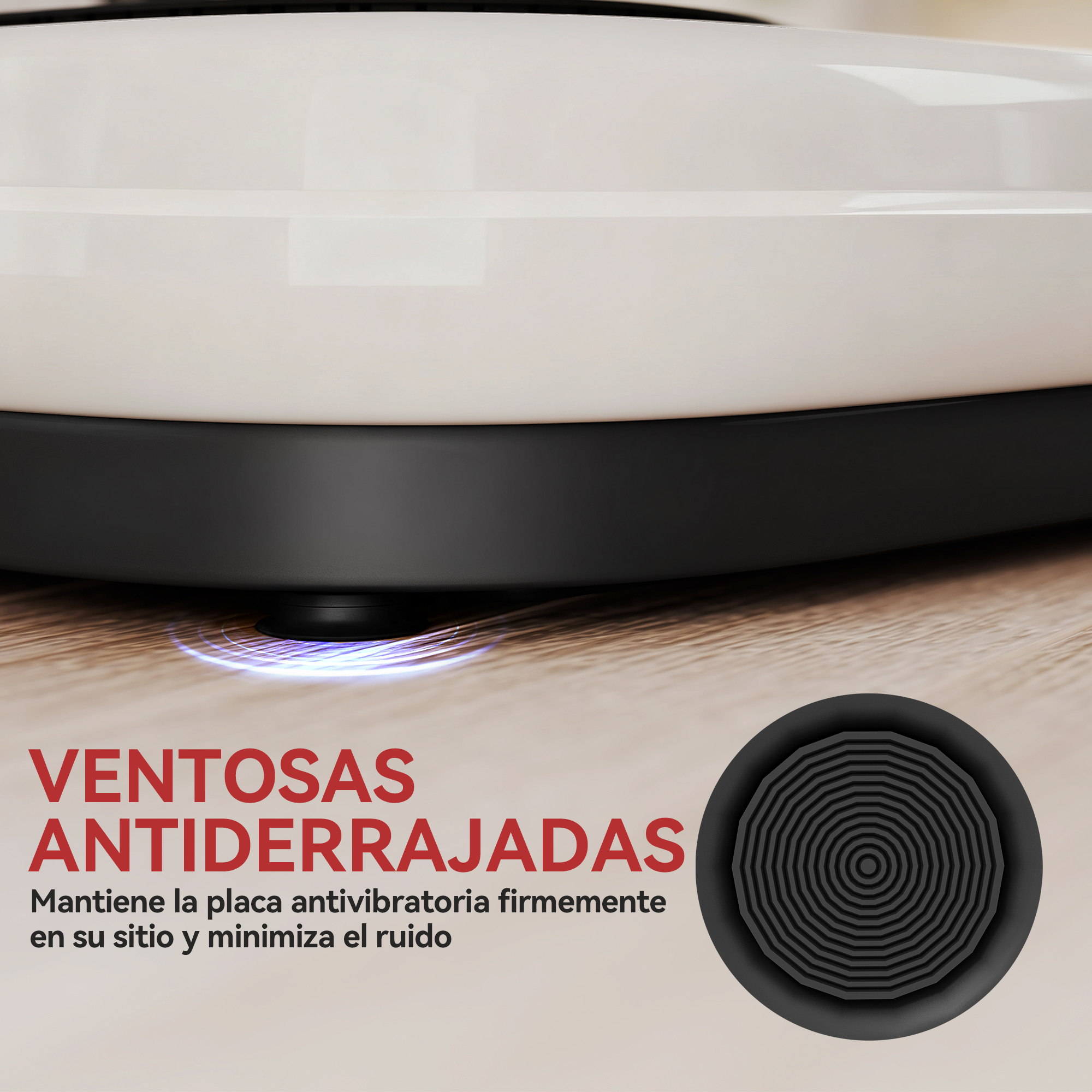Un pie negro antideslizante con anillos concéntricos sobre suelo de madera.