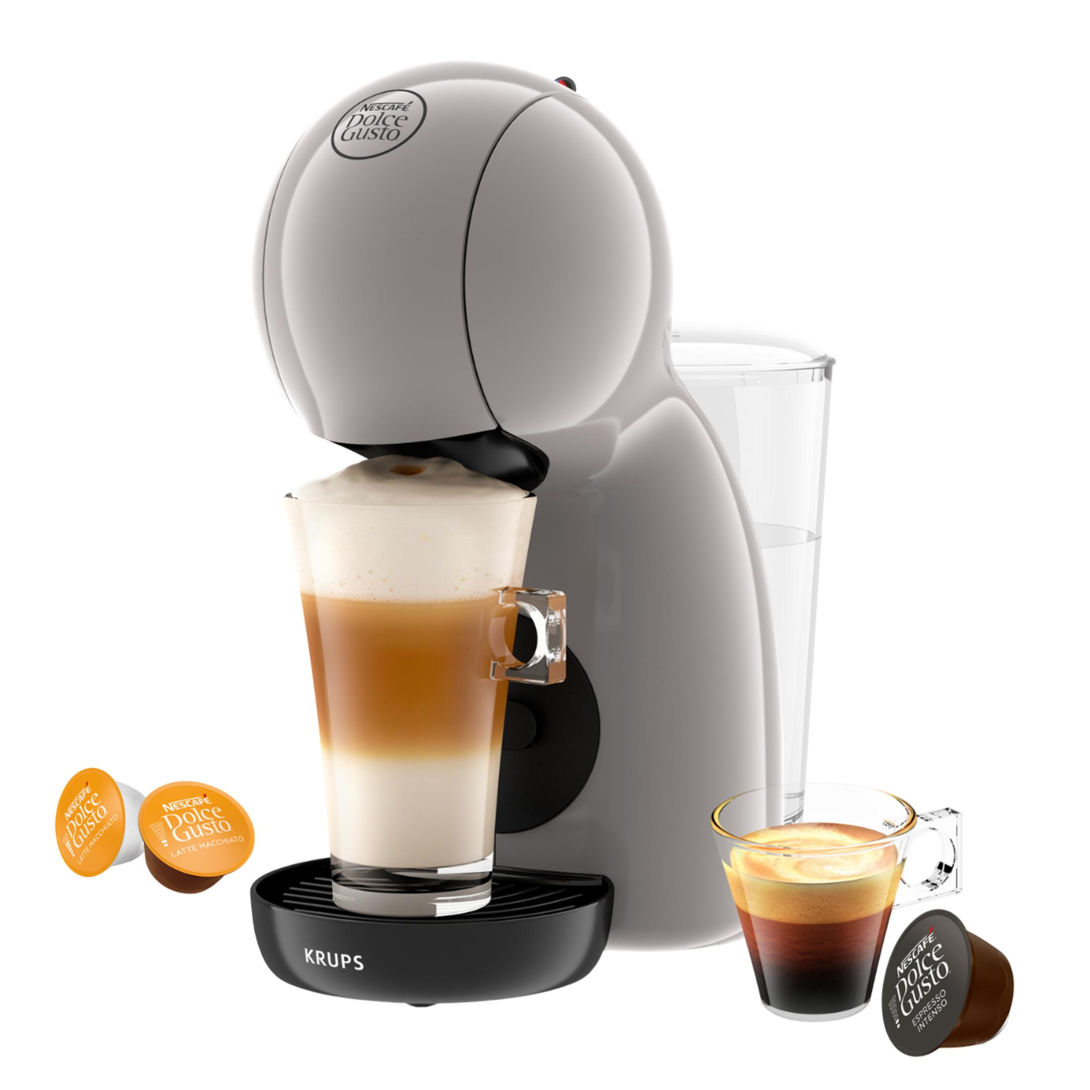Een grijze Nescafé Dolce Gusto koffiezetapparaat maakt latte macchiato en espresso.