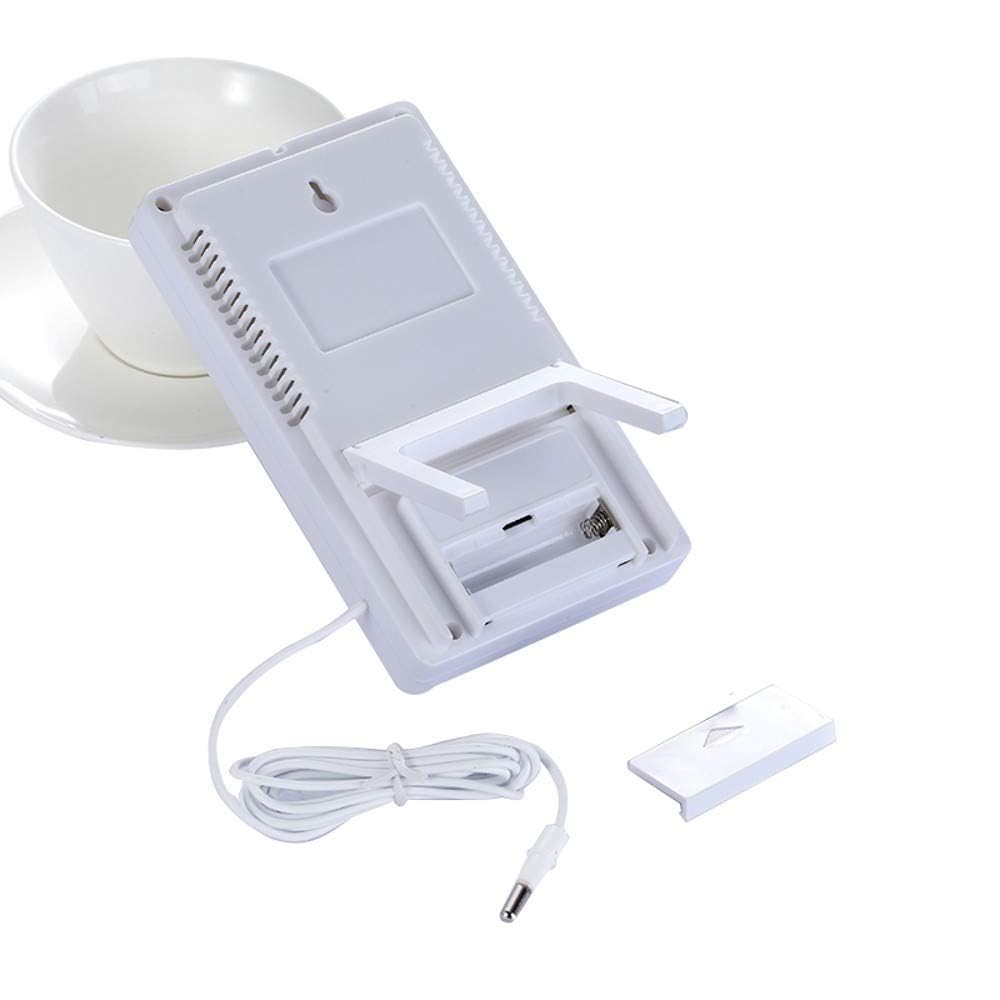 Ein weißes Digitalthermometer mit abgenommenem Batteriefach und Kabel.