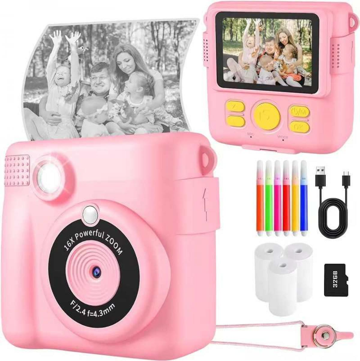 Eine pinke Digitalkamera mit Zubehör: Farbstifte, USB-Kabel, Speicherkarte, Papierrollen.