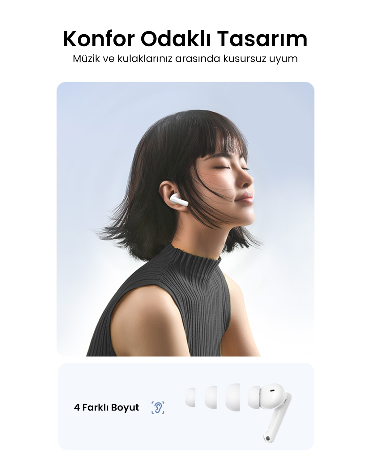 Kobieta z zamkniętymi oczami nosi białe słuchawki, z nakładkami na uszy na pierwszym planie.