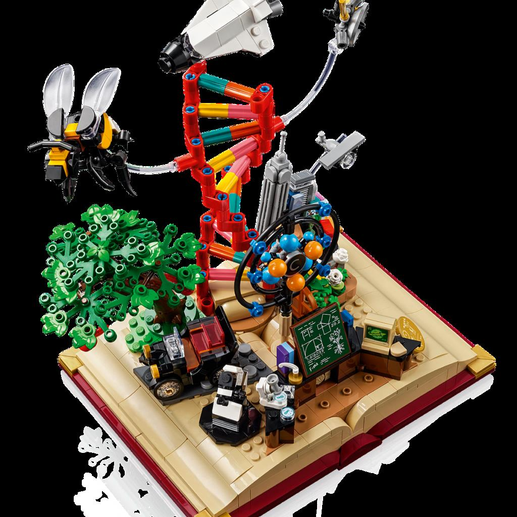 DNA sarmalı, arı, ağaç, mikroskop ve uzay gemisi içeren Lego diyorama.