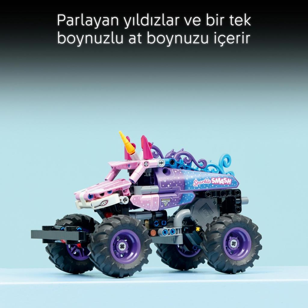 Fioletowy i różowy monster truck z motywem jednorożca, dużymi kołami i gwiazdami.