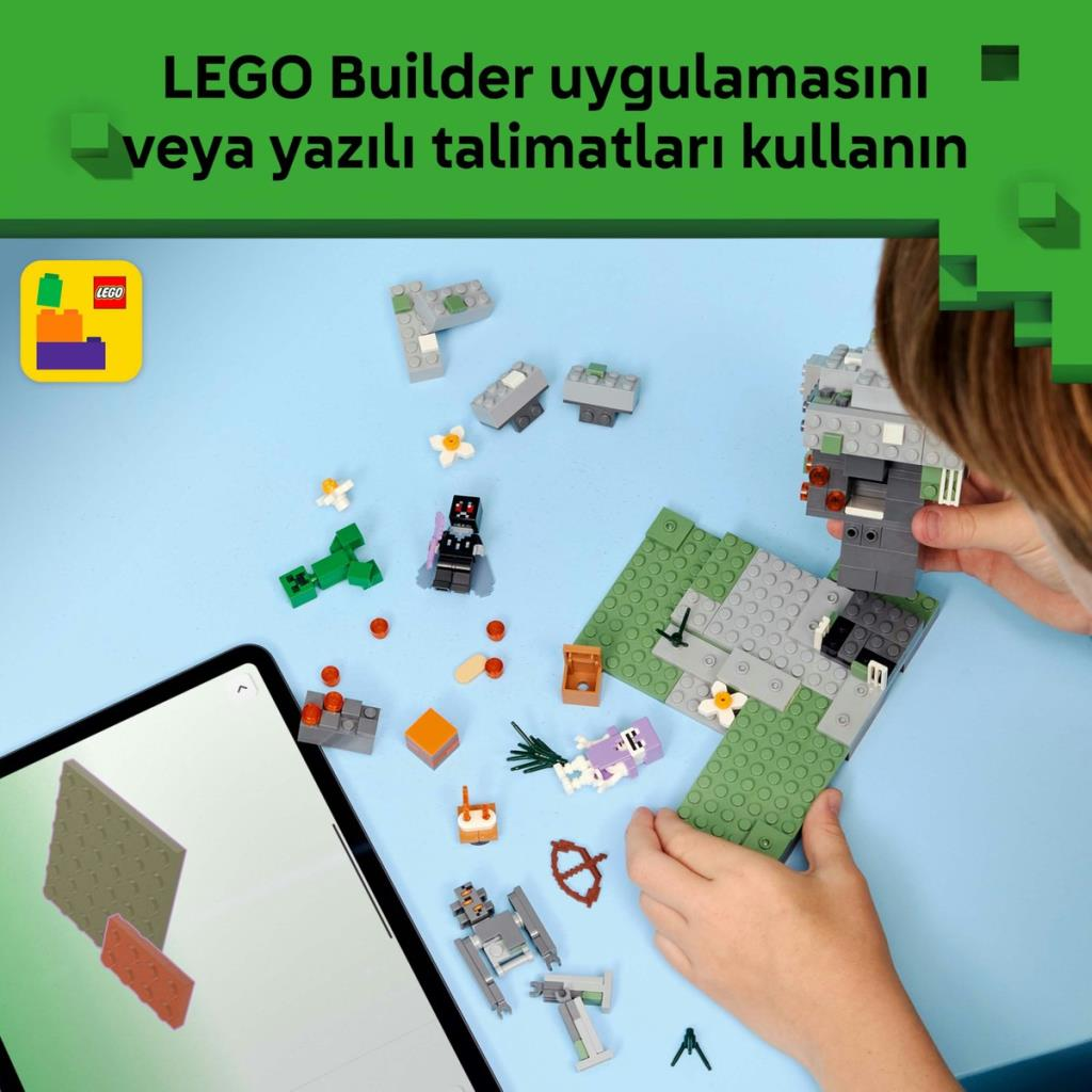 Dziecko buduje z klocków LEGO, obok tablet z instrukcją.