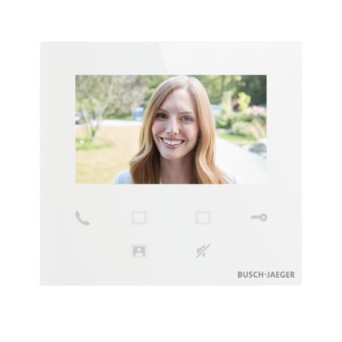Modulo videocitofono Busch-Jaeger bianco con donna sorridente sullo schermo. Icone sotto.