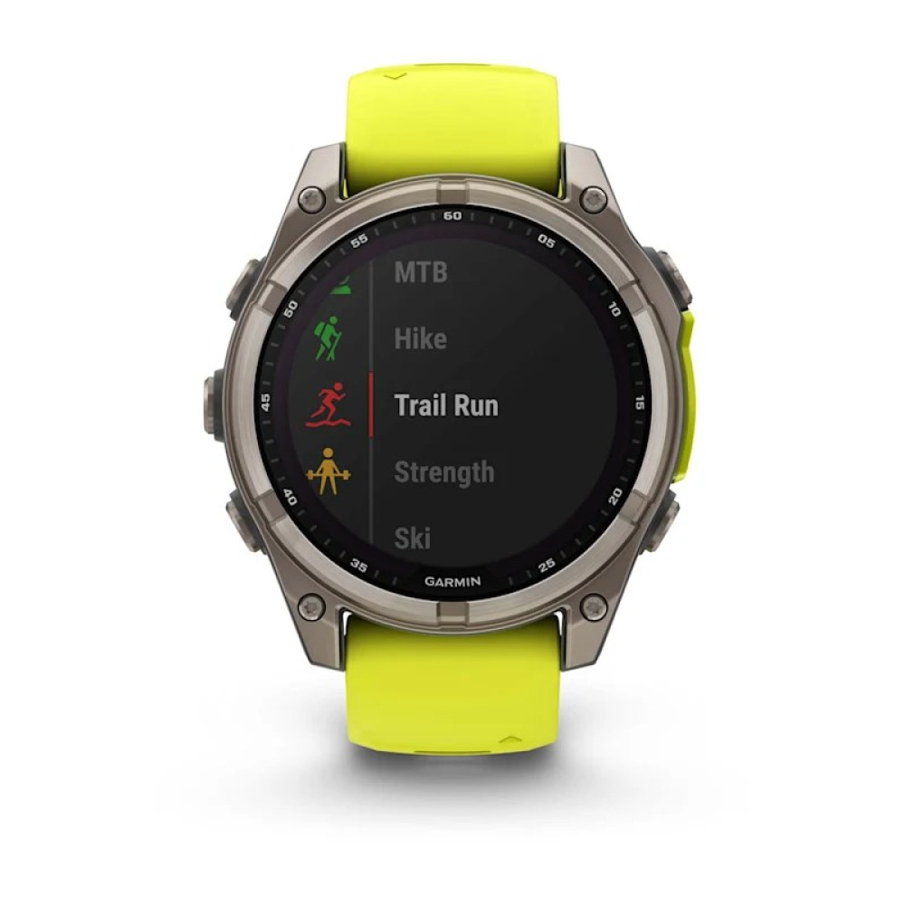 Szary smartwatch z neonowo-żółtym paskiem, pokazujący tryby sportowe.