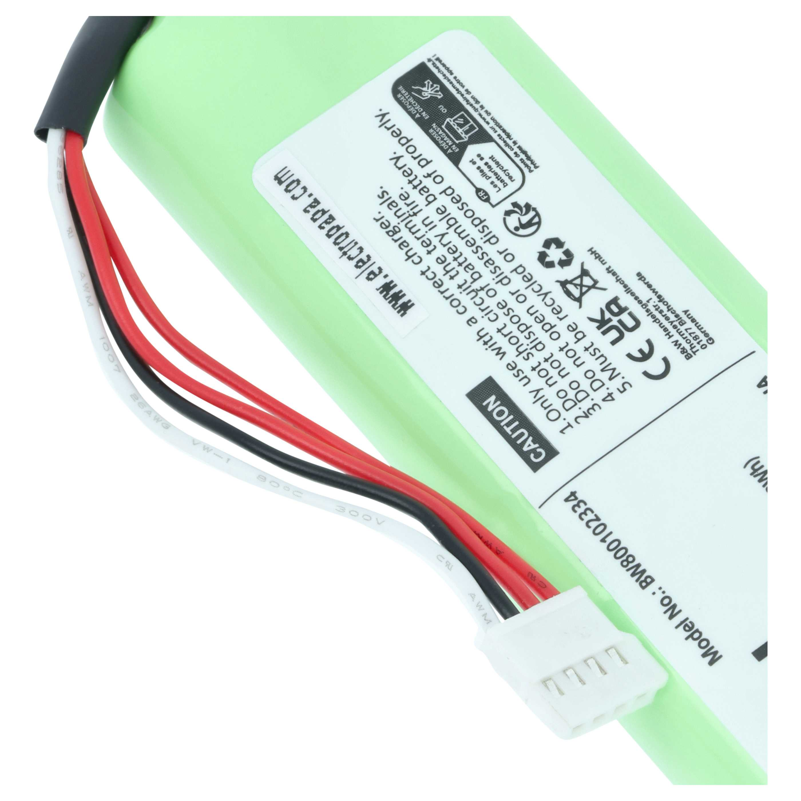 Grüne Batterie mit Kabeln und Warnhinweisen.