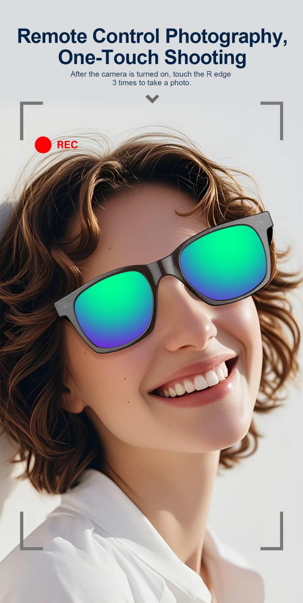 Eine Frau mit Sonnenbrille lächelt, im Vordergrund sind Aufnahmerahmen.