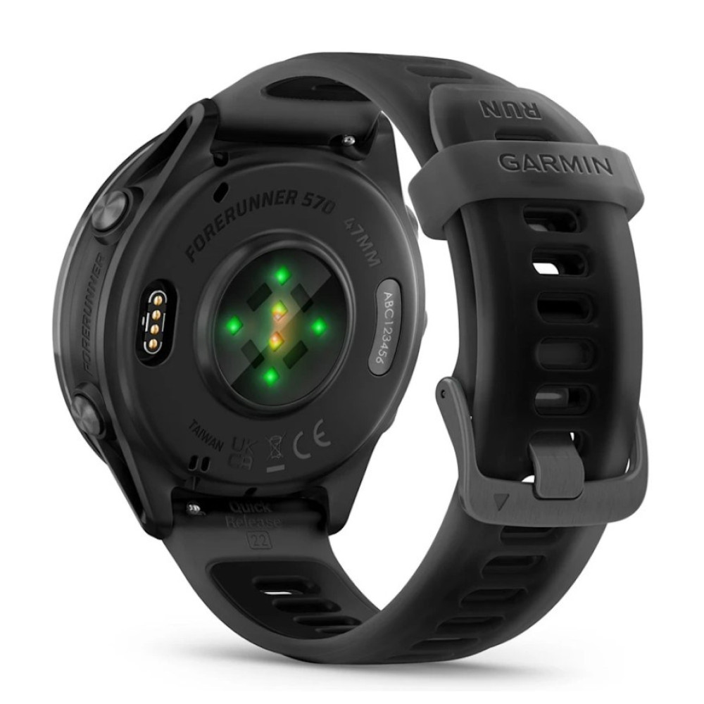 Tył czarnego smartwatcha Garmin Forerunner 570 z czujnikiem tętna i czarnym paskiem.