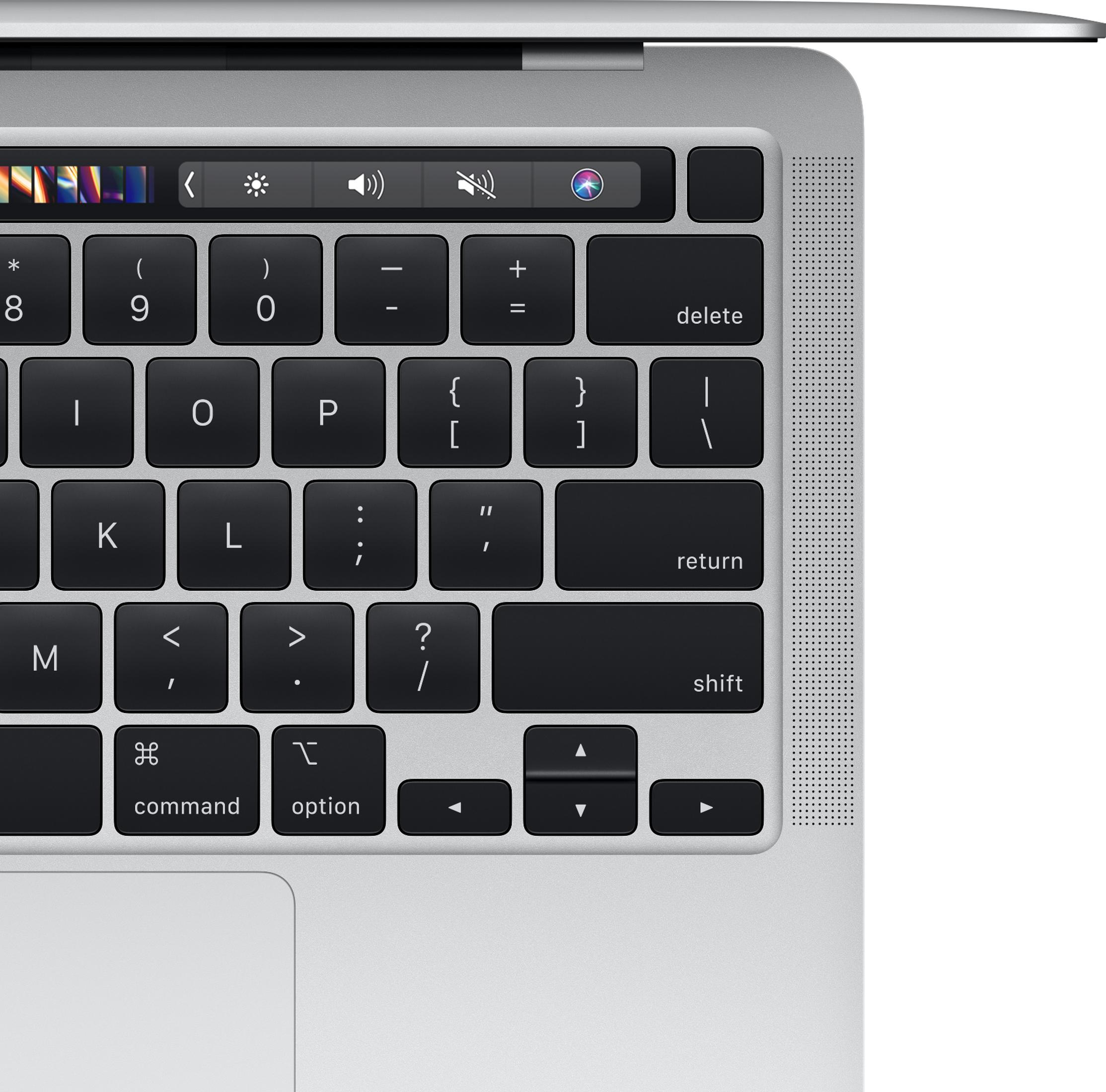 Primo piano di una tastiera per laptop con Touch Bar e griglie altoparlanti.