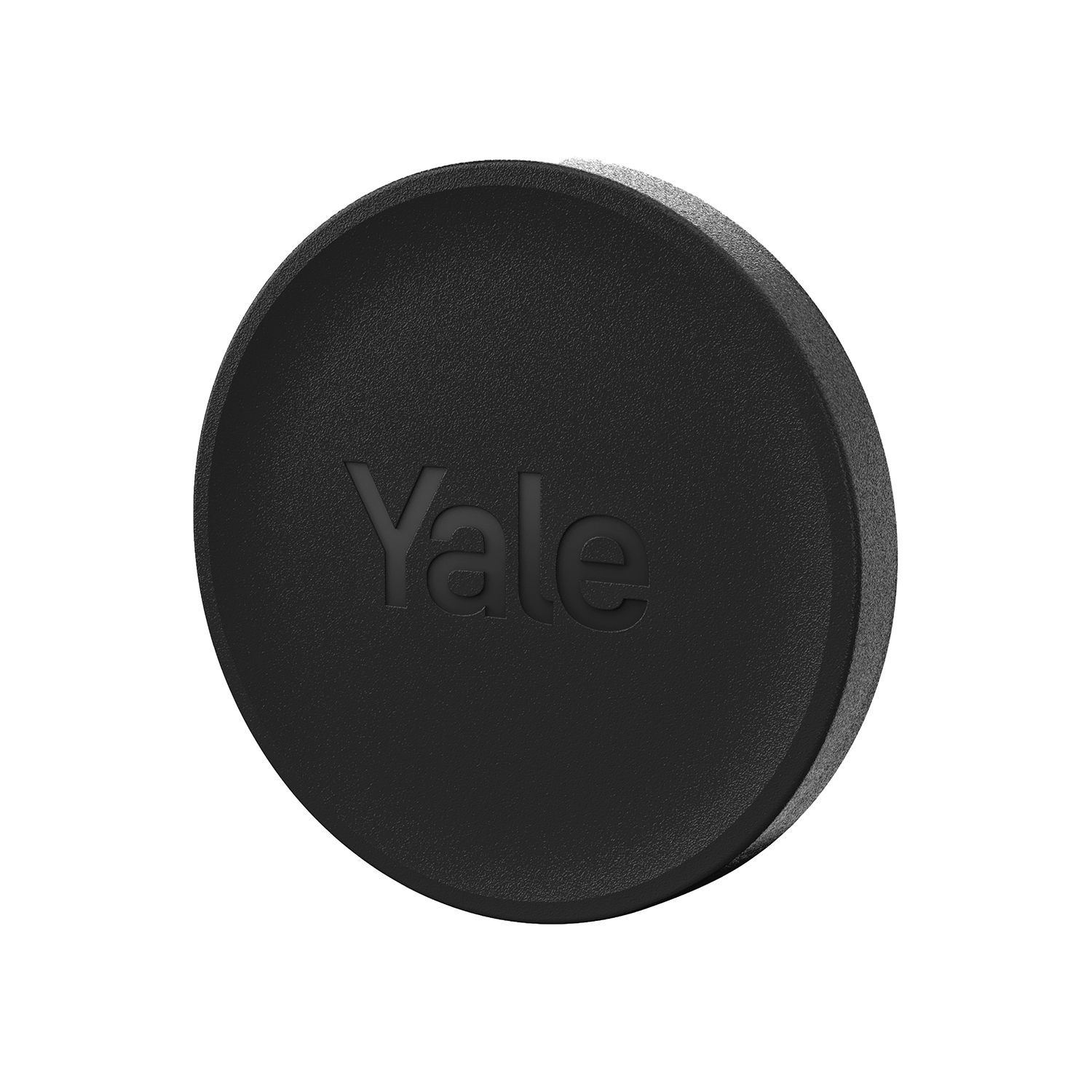 Llavero redondo negro de Yale con logo en relieve, aislado sobre blanco.