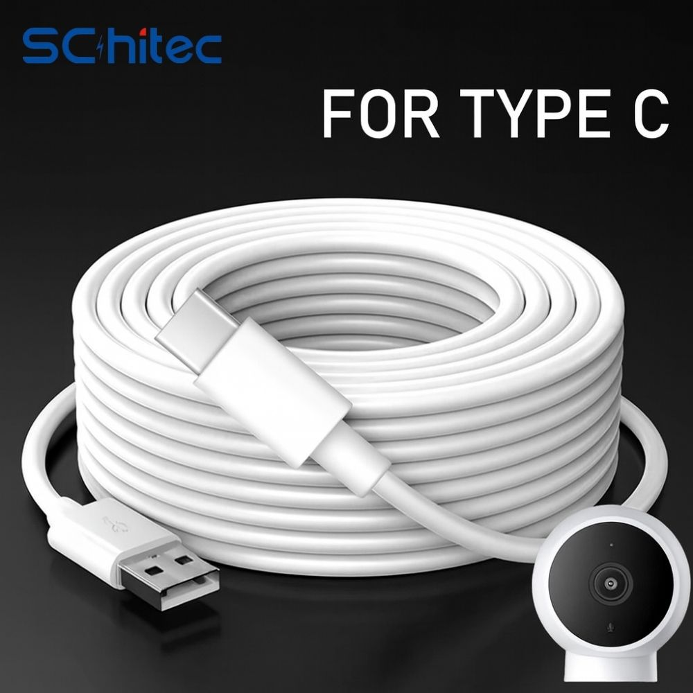 Küçük bir kamera ve USB-A fişli beyaz USB-C kablosu.