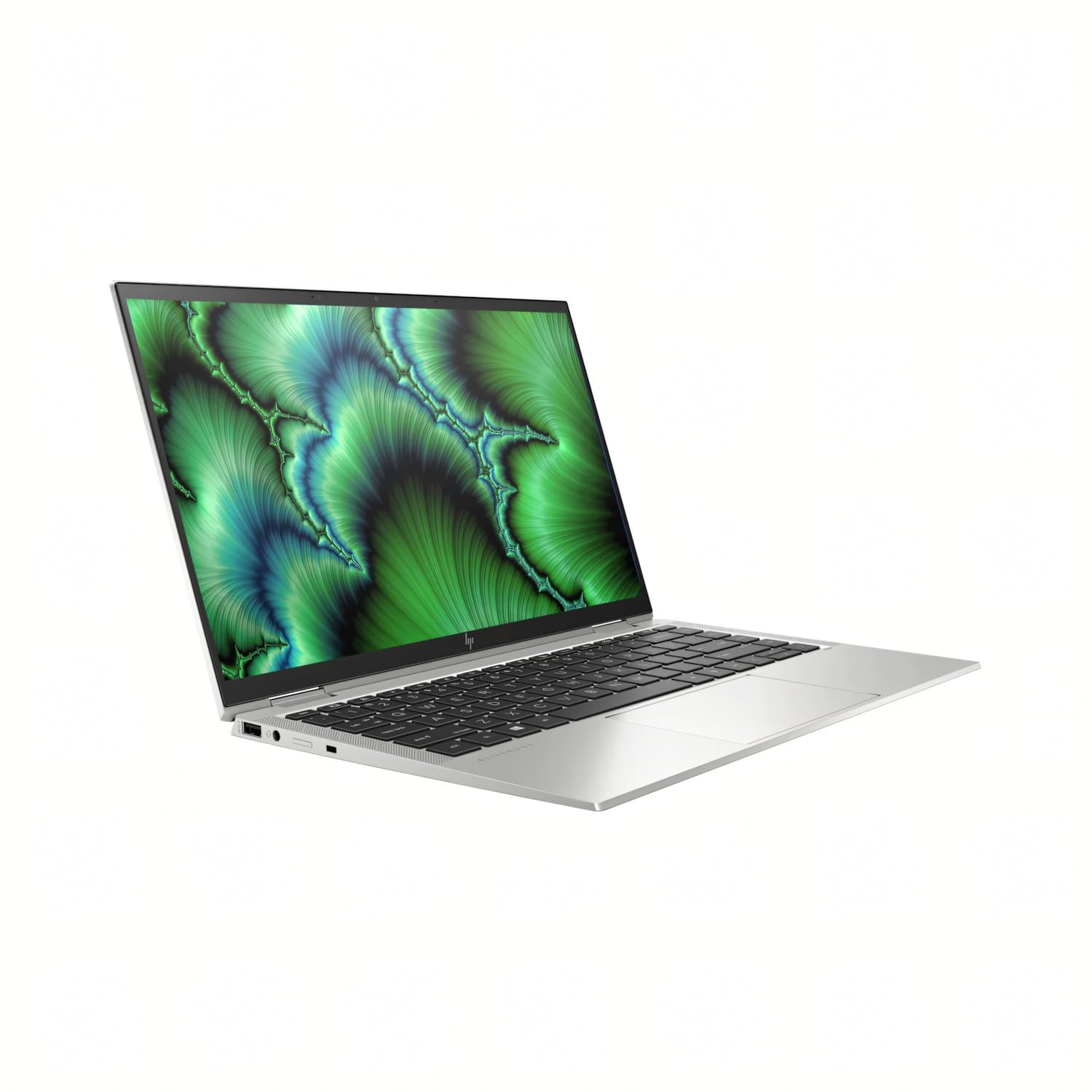 Un portátil plateado con un fondo fractal verde y azul en la pantalla.
