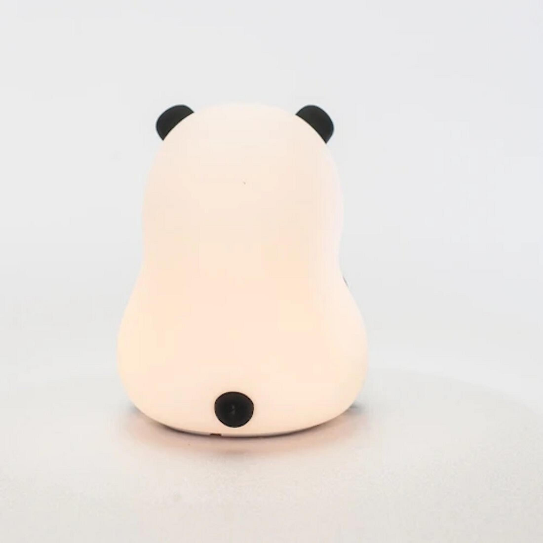 Rückansicht einer leuchtenden Panda-Lampe mit schwarzen Ohren und einem schwarzen Knopf.