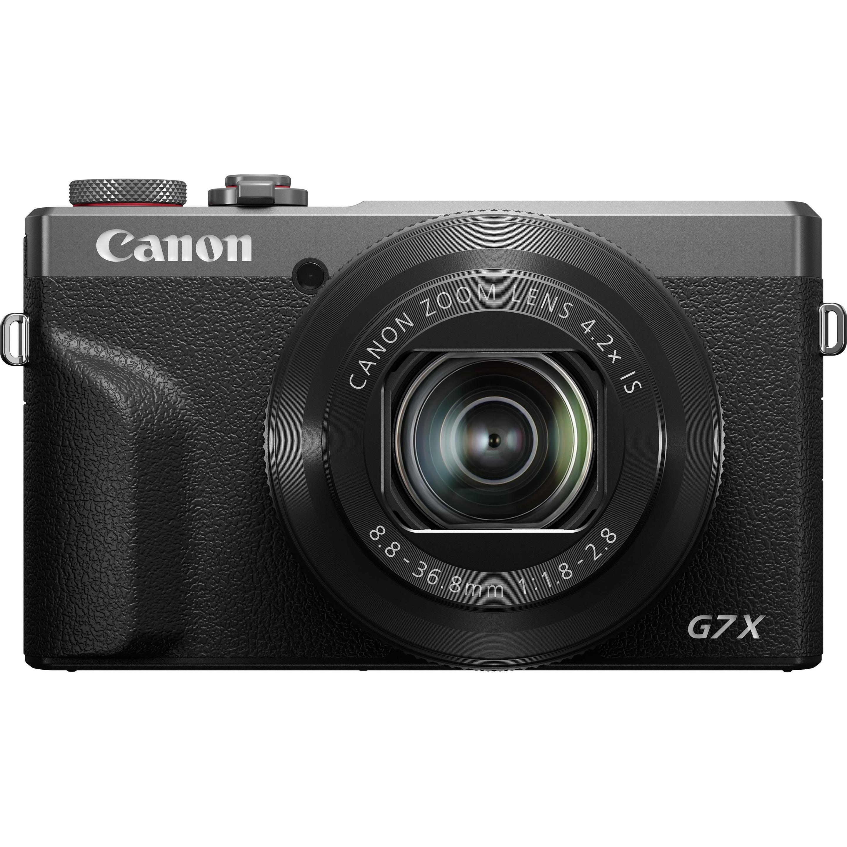Eine schwarze Canon G7X Digitalkamera mit Zoomobjektiv auf weißem Hintergrund.
