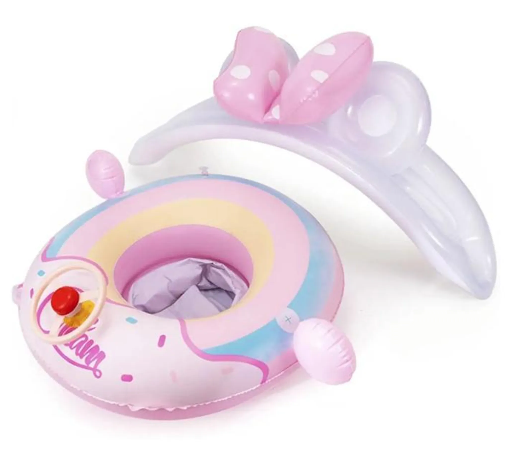Ein aufblasbarer Schwimmring mit Regenbogenmuster und ein Bogen mit rosa Hasenohren.