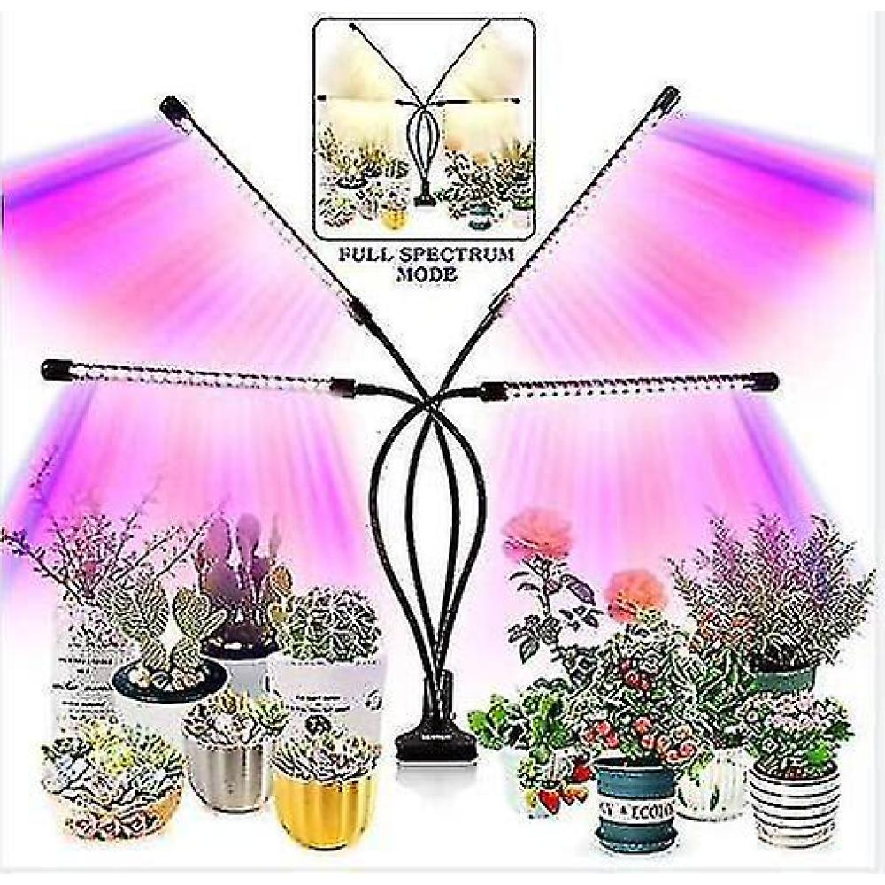 Pflanzenwachstumslampe mit vier flexiblen Armen über verschiedenen Topfpflanzen.