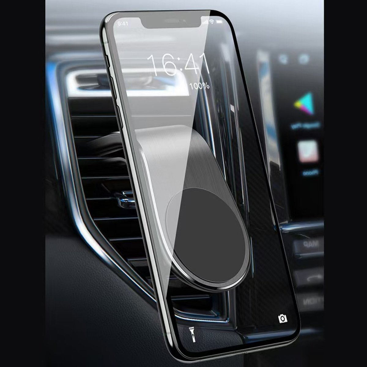 Ein Smartphone mit einem Magnete-Halter, das an einem Lüftungsschlitz im Auto befestigt ist.