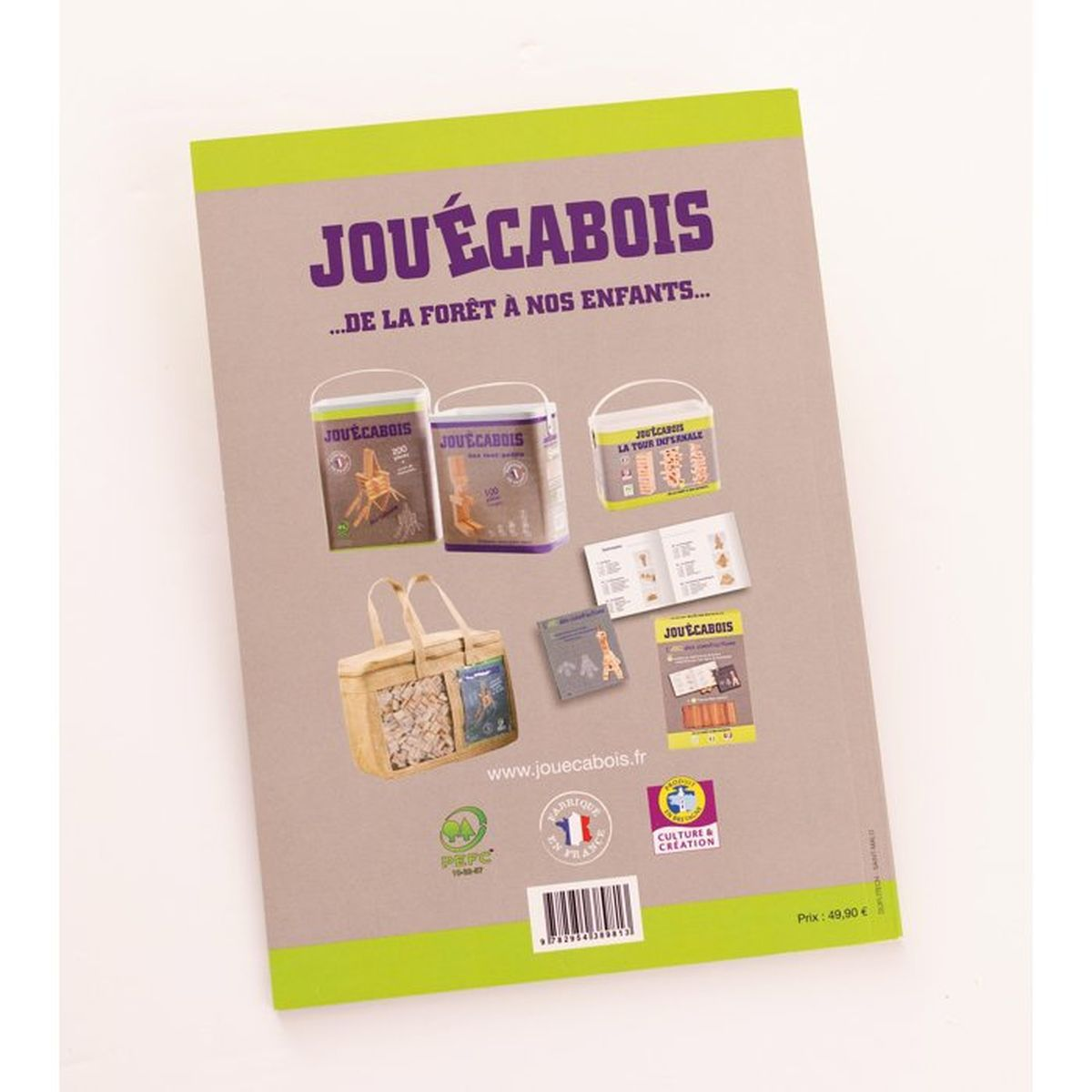 Retro di un libro con giocattoli e cartellino del prezzo.