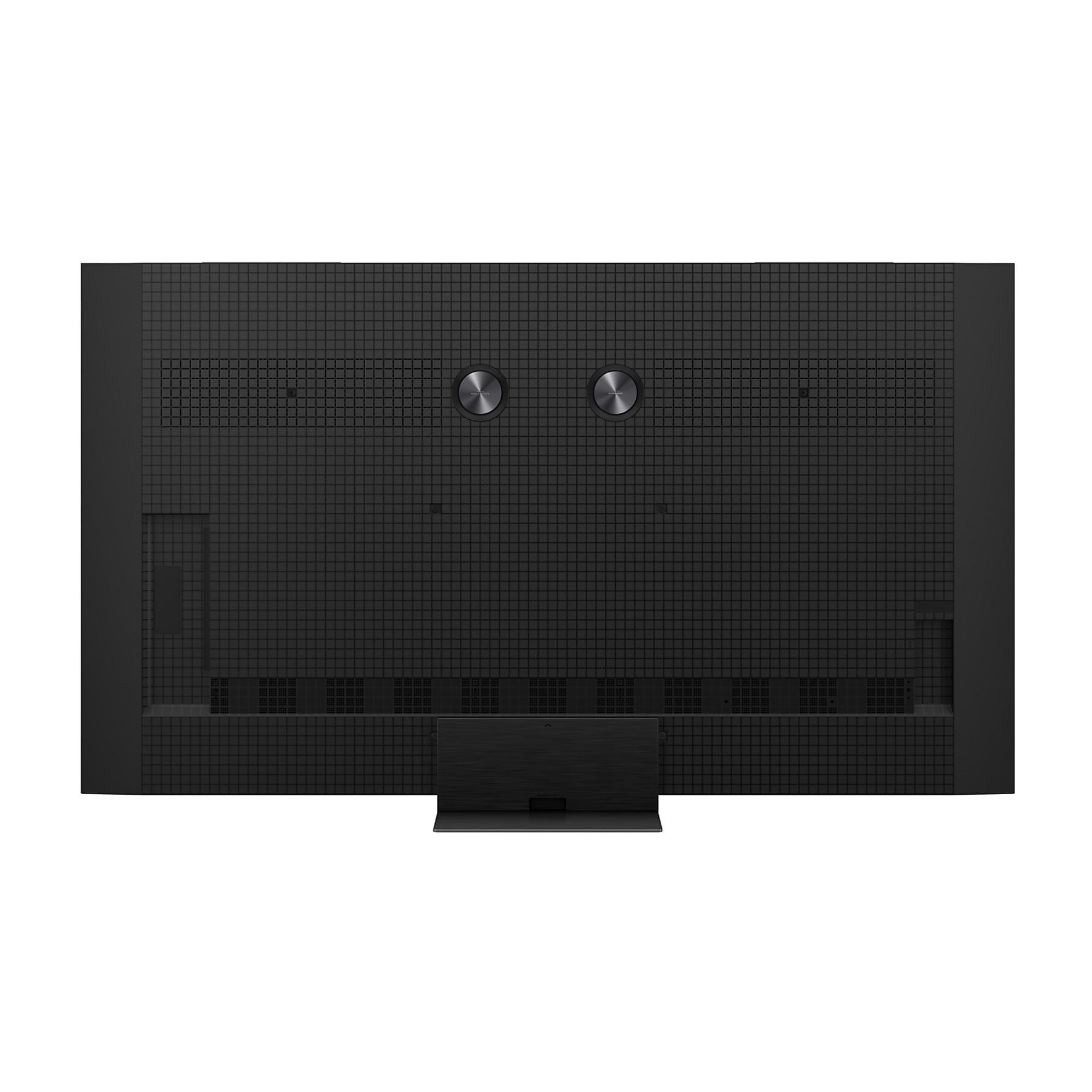 La parte trasera de un televisor negro con patrón de rejilla y dos botones circulares.