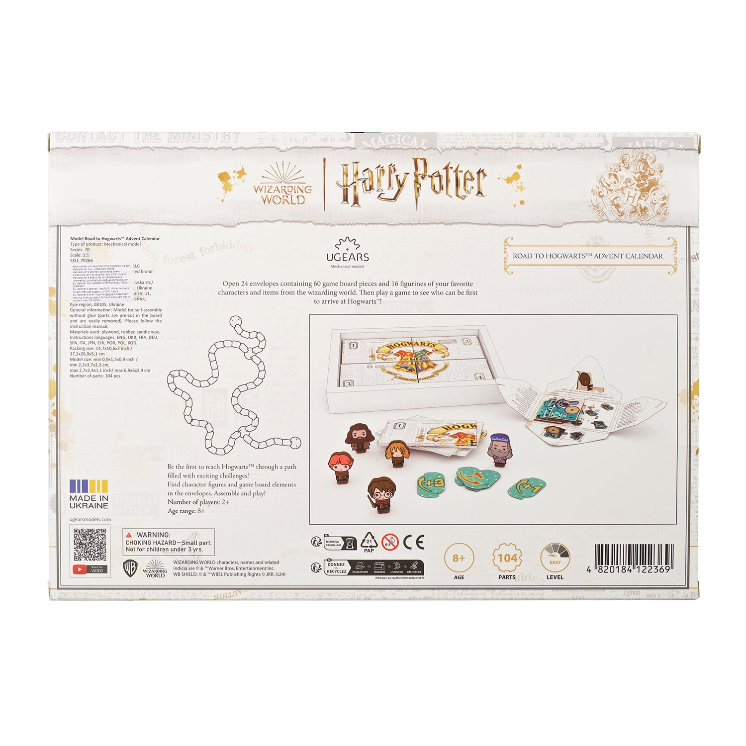 Harry Potter Adventskalender mit Spielfiguren und Spielbrettteilen in der Verpackung.