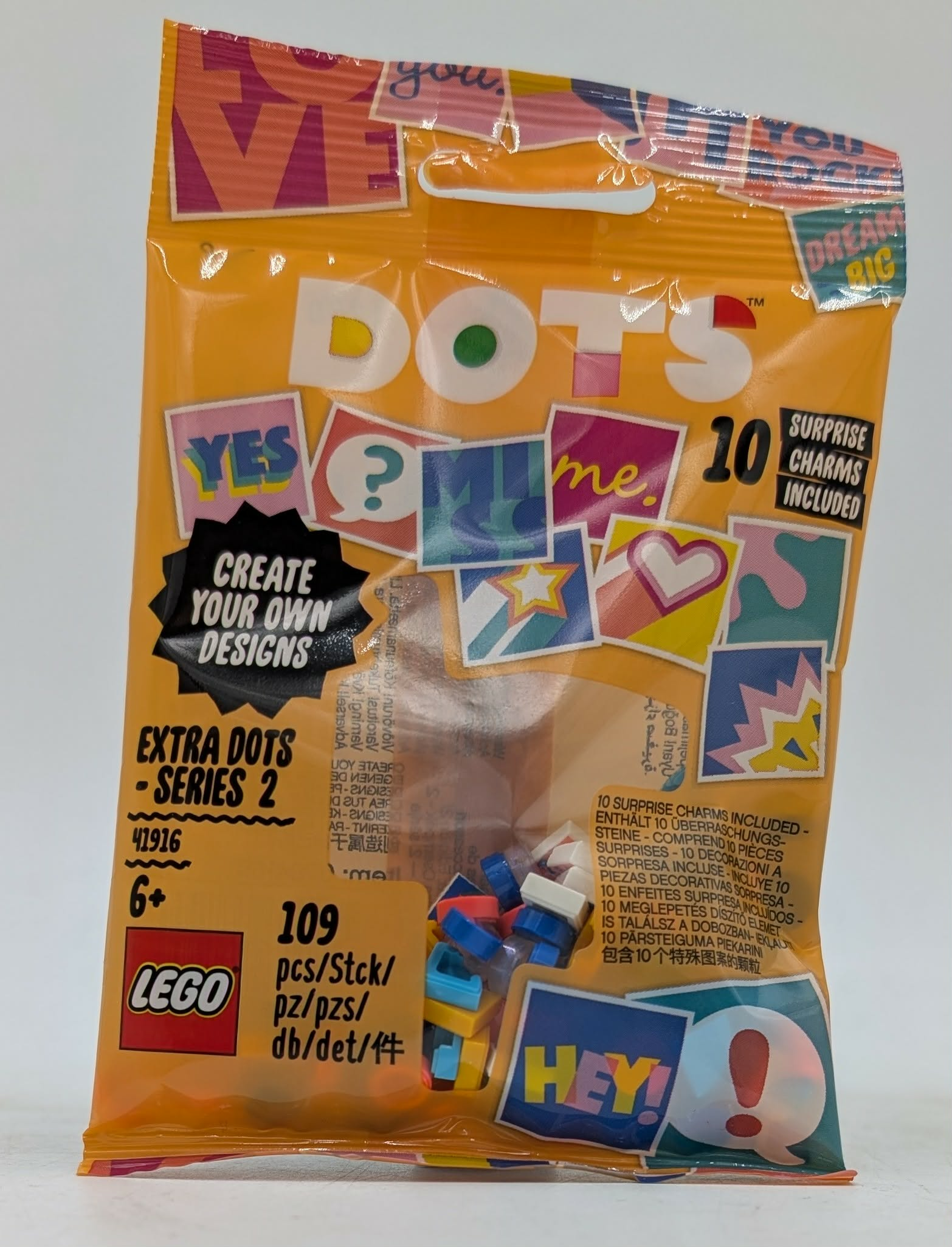 Verpackung für LEGO Dots Extra Dots - Serie 2 mit bunten Bildern und Text.