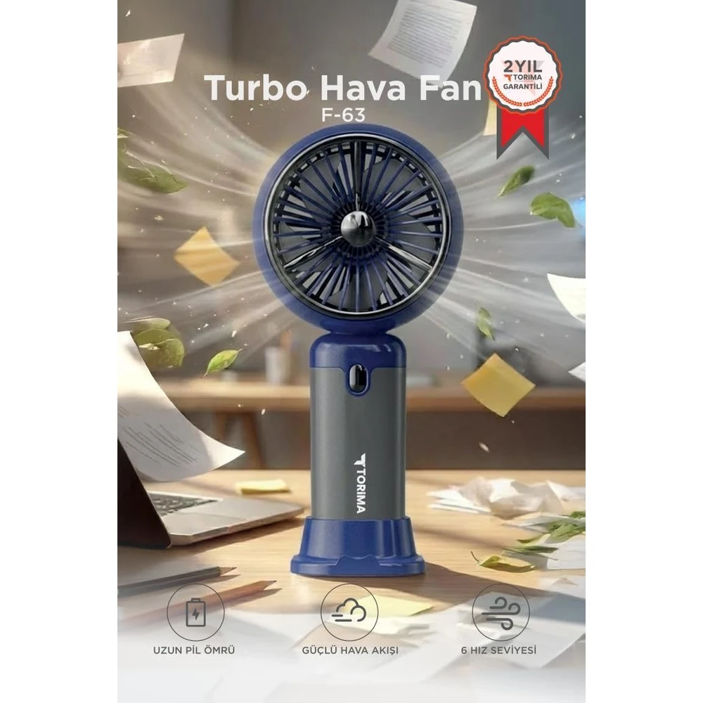 Etrafta uçuşan yapraklar ve kağıtlarla mavi ve gri Turbo Hava Fan F-63.