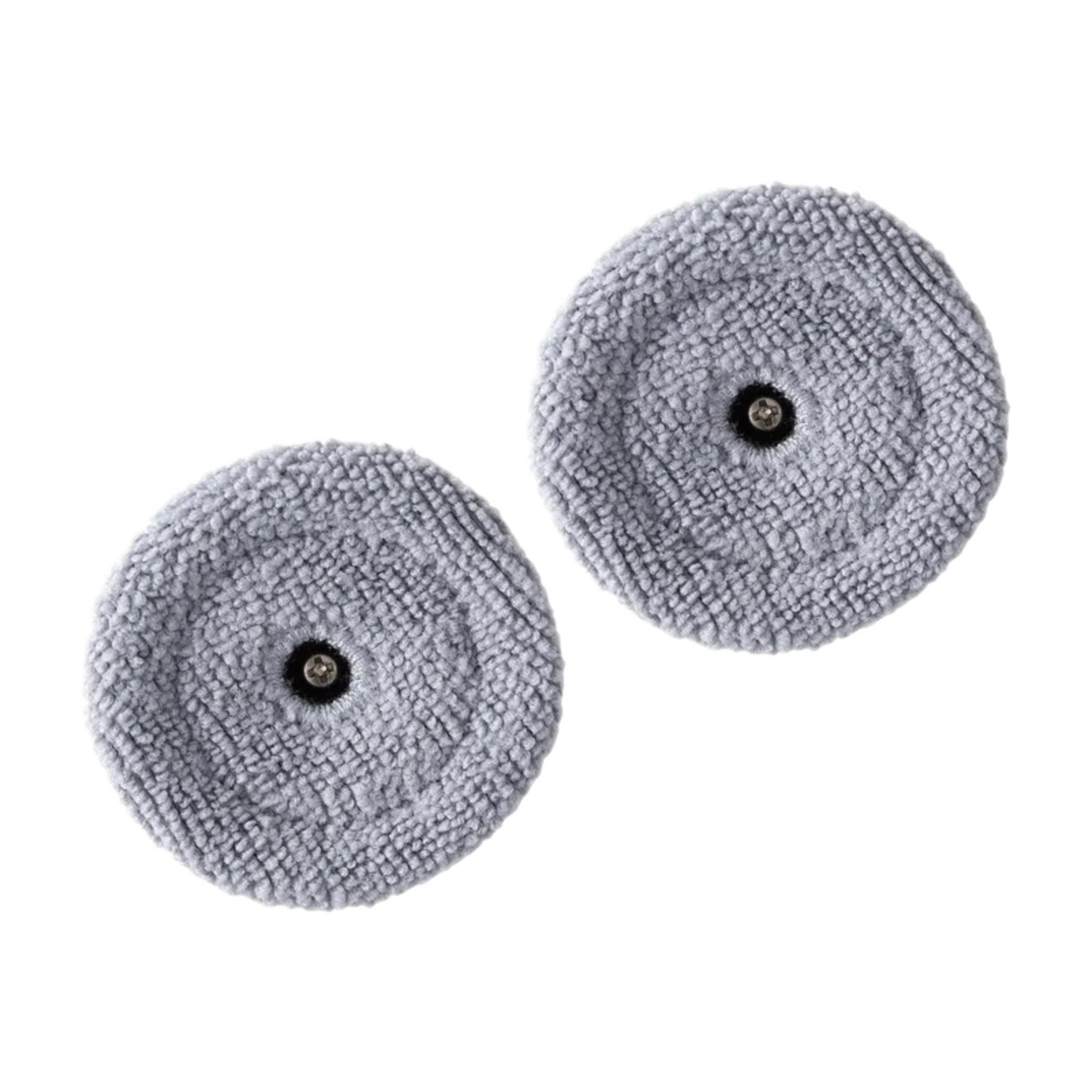 Siyah merkezli iki gri, yuvarlak mikrofiber ped yan yana gösterilmektedir.