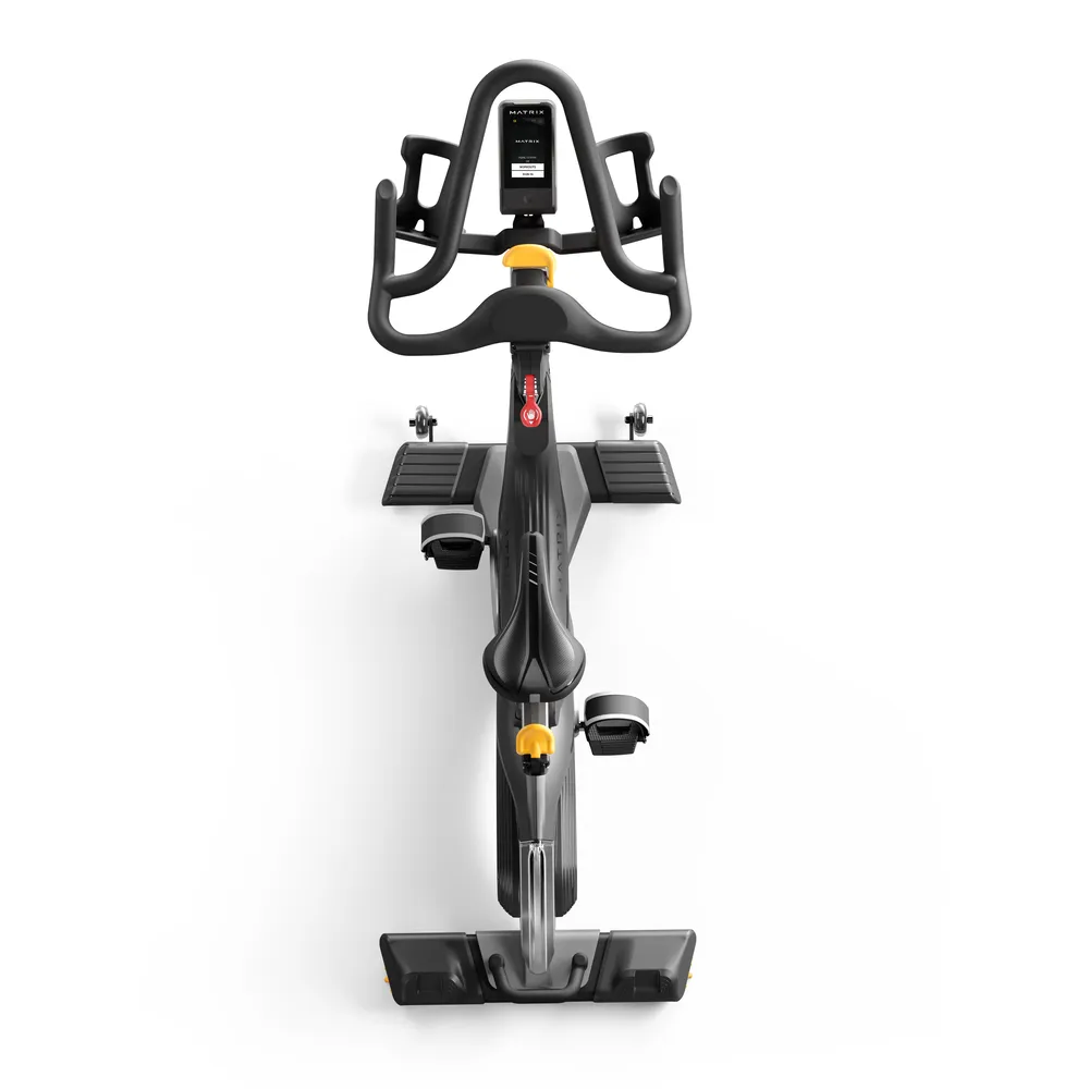 Ein schwarzes Trainingsfahrrad mit gelben Akzenten und einem Bildschirm.