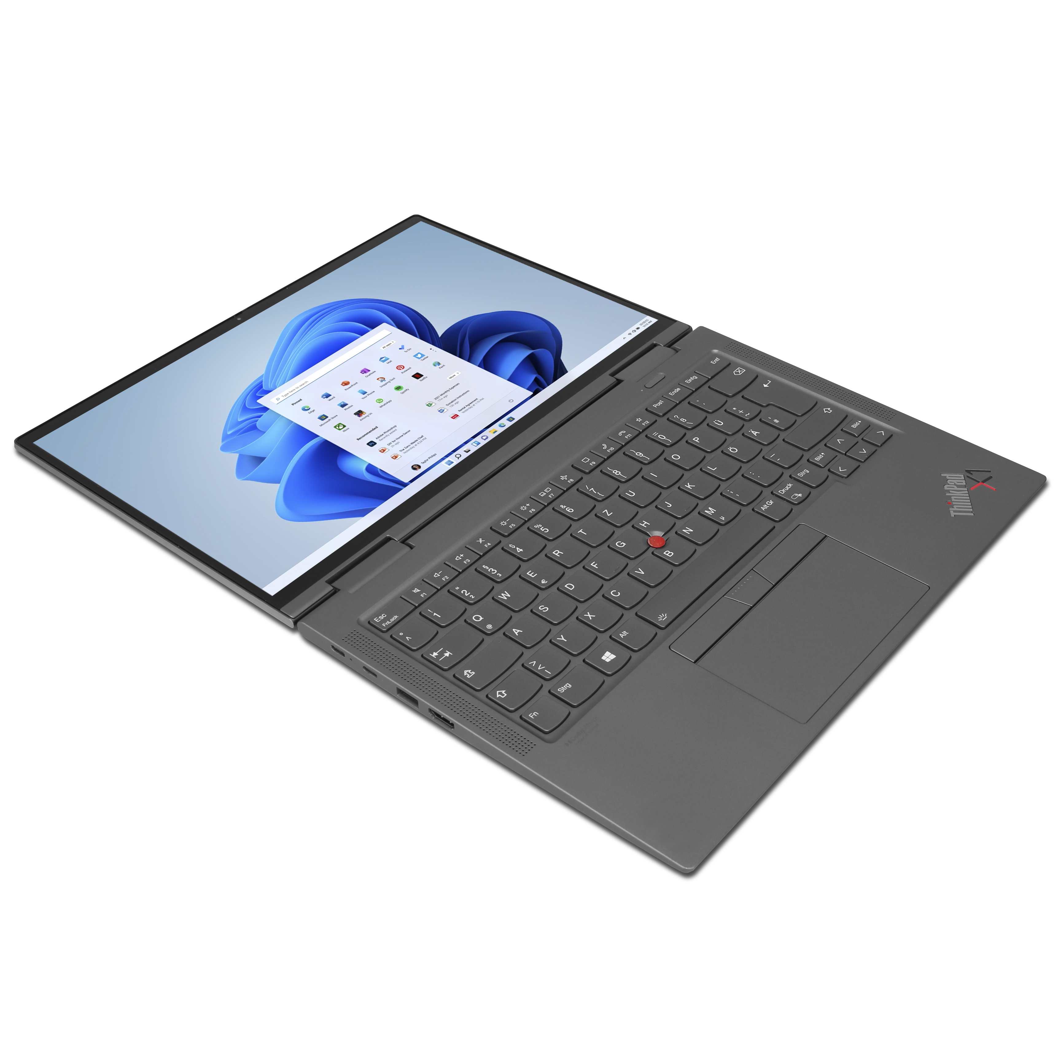 Laptop grigio con schermo aperto che mostra Windows 11 e tastiera.