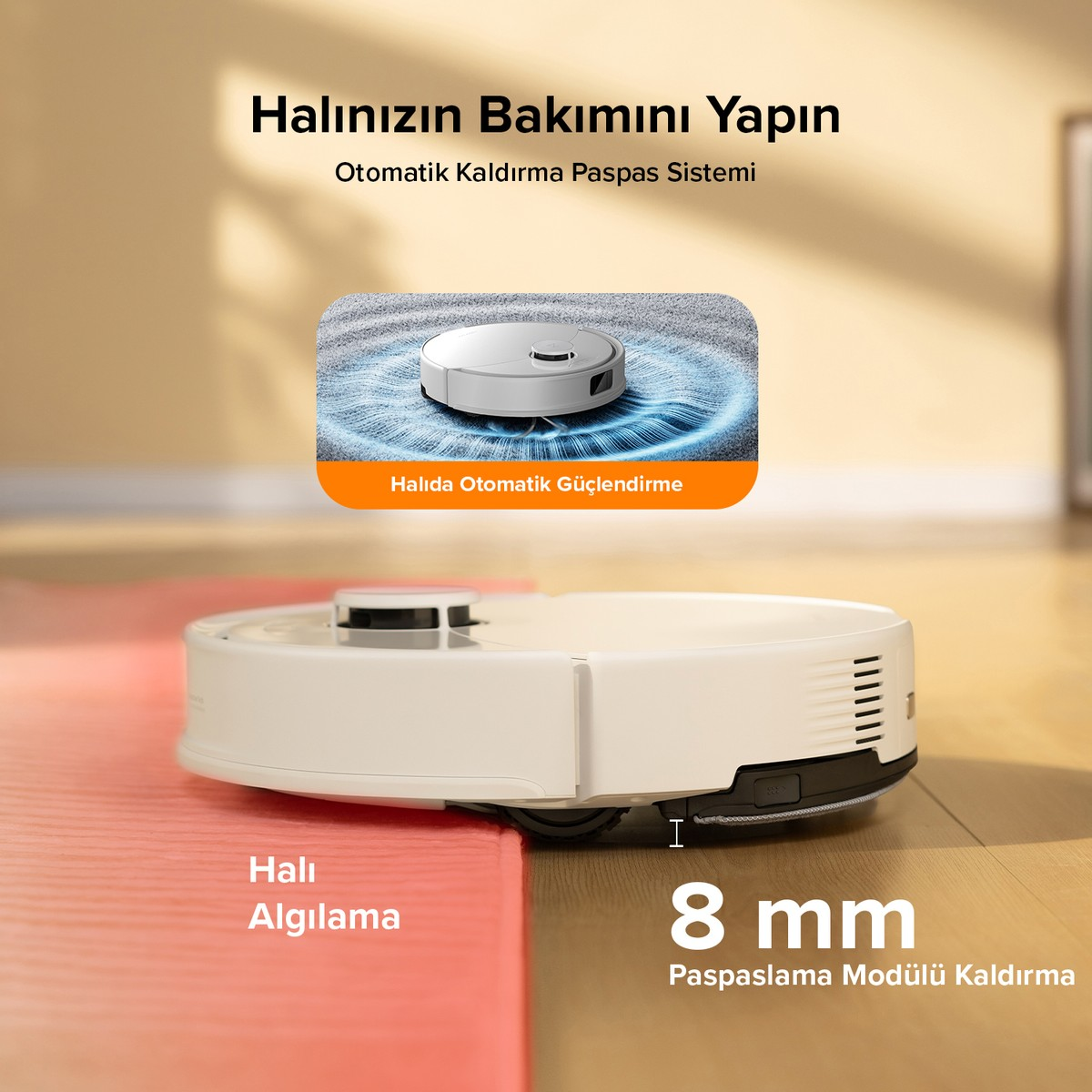Beyaz robot süpürge, paspas modülünü kaldırarak pembe bir halıya giriyor.