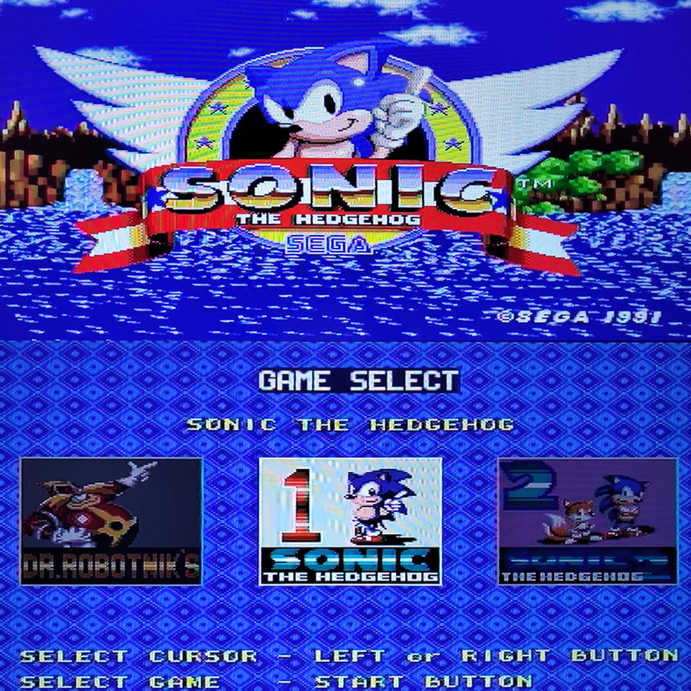Sonic, Dr. Robotnik ve Tails'in yer aldığı Sonic the Hedgehog oyun seçme ekranı.