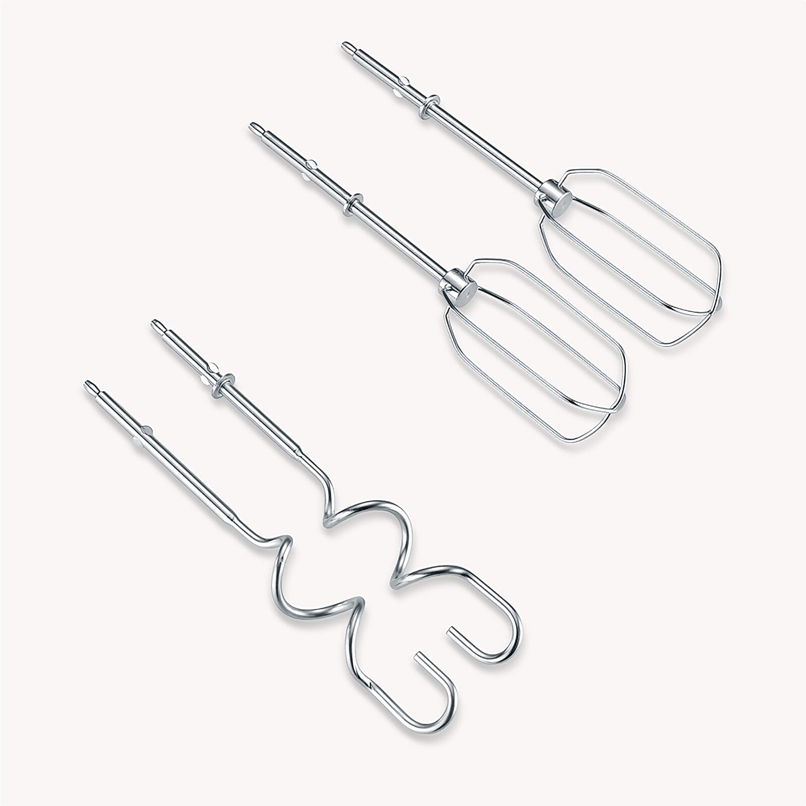 Three metal mixer attachments: two whisk beaters and one dough hook.