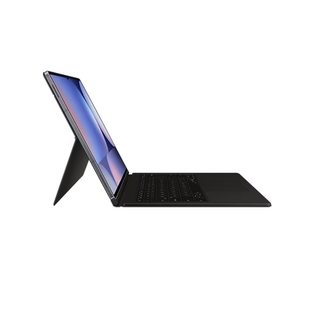 Beyaz zeminde siyah klavyeli ve stantlı açık gümüş tablet.