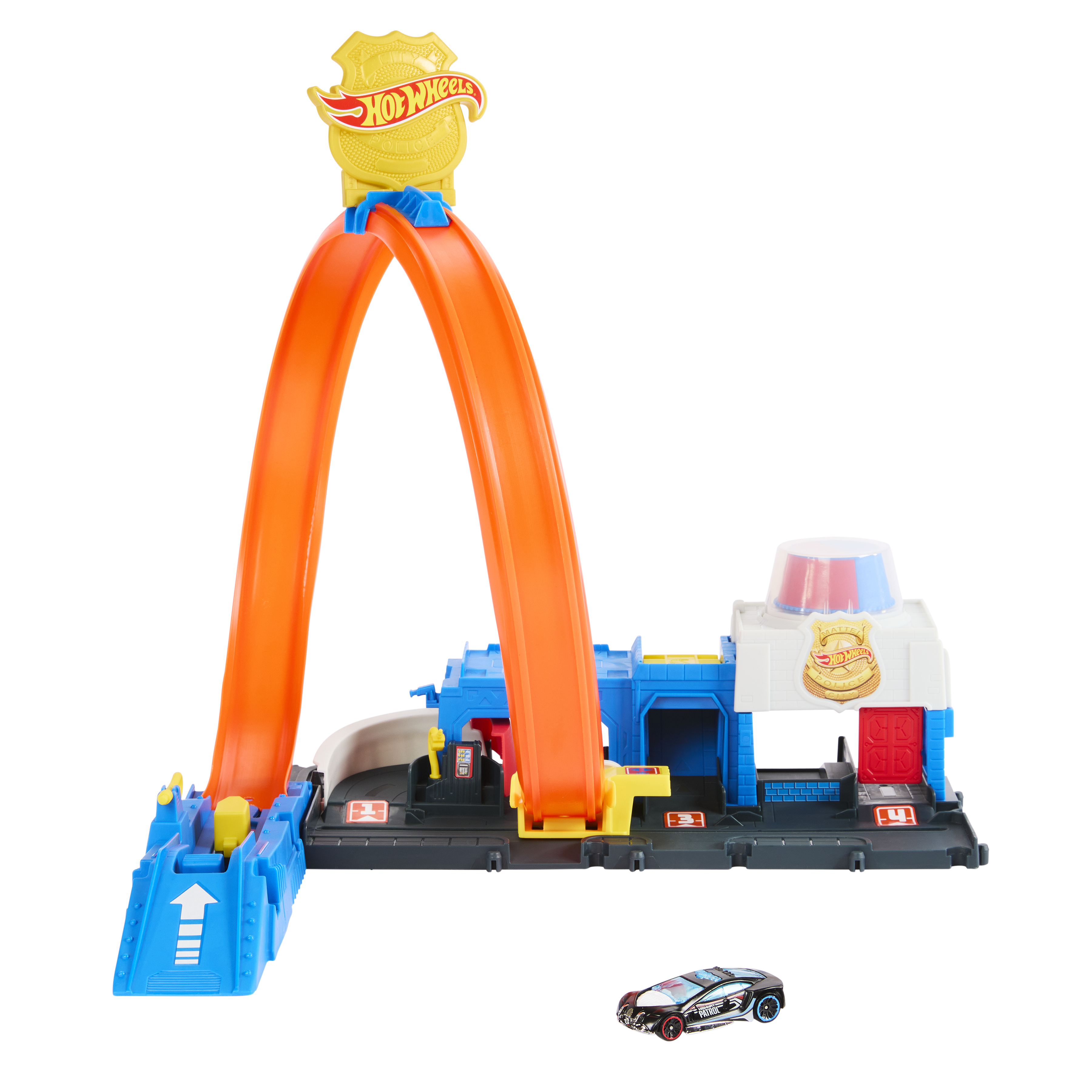 Un set de juego Hot Wheels con estación de policía, bucle y un coche.