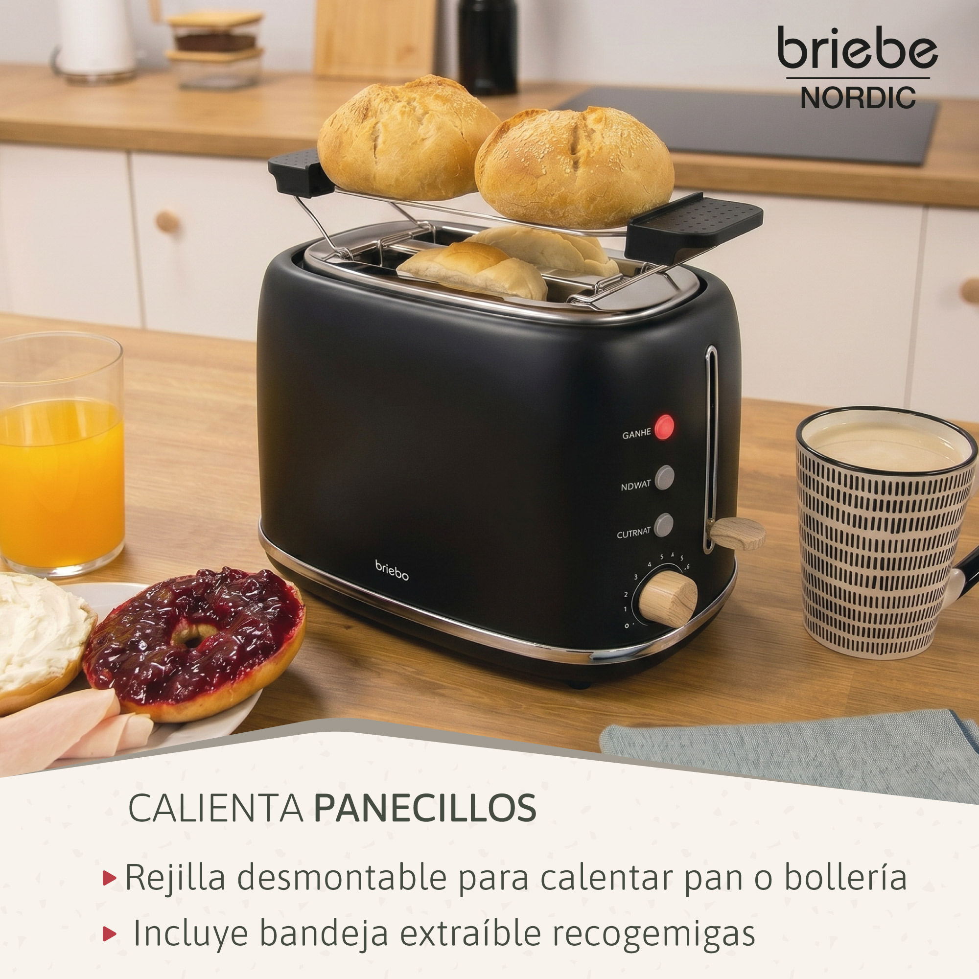 Tostadora negra con bollos, zumo, café y un bagel con mermelada.