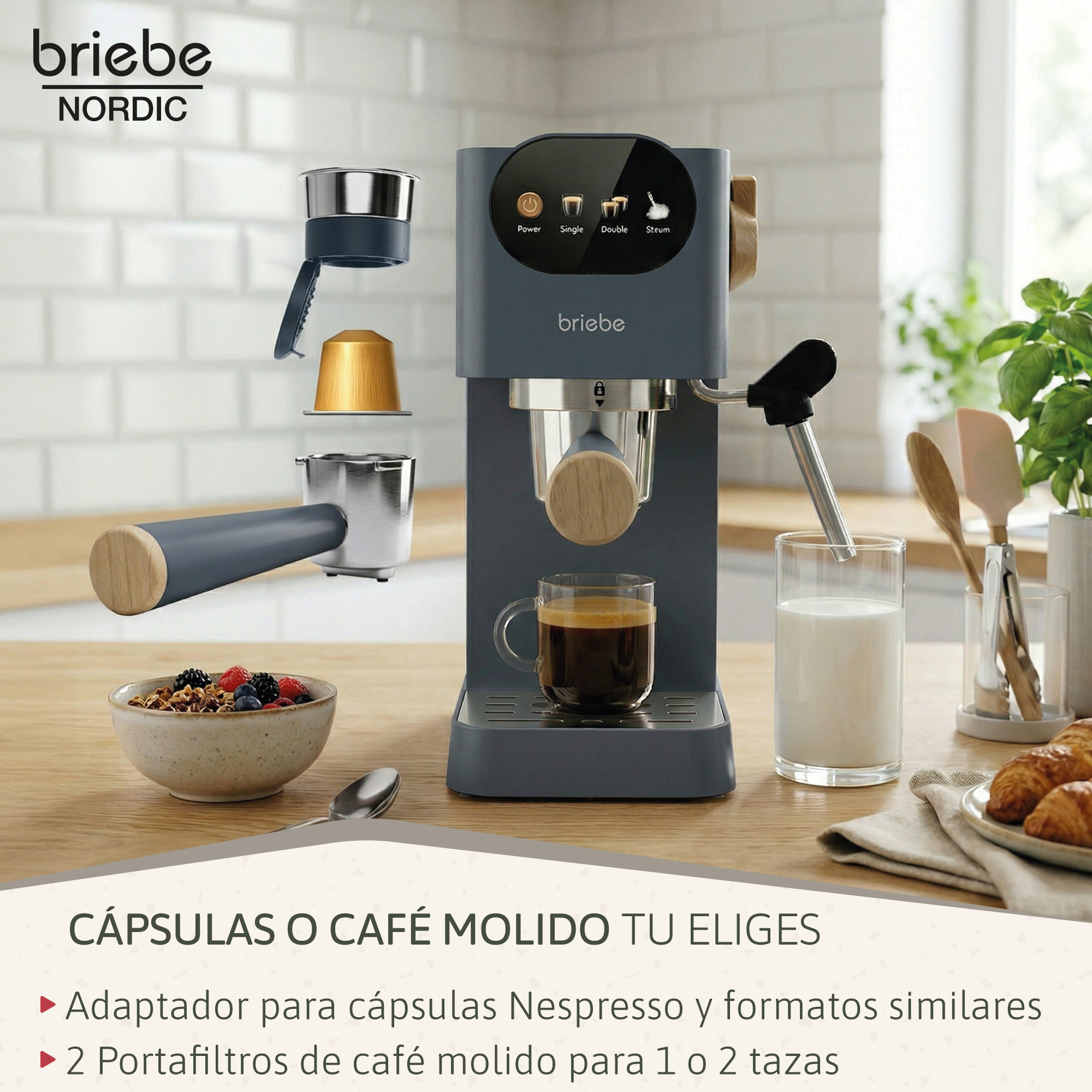 Una cafetera espresso gris con accesorios, café, leche y bollería.