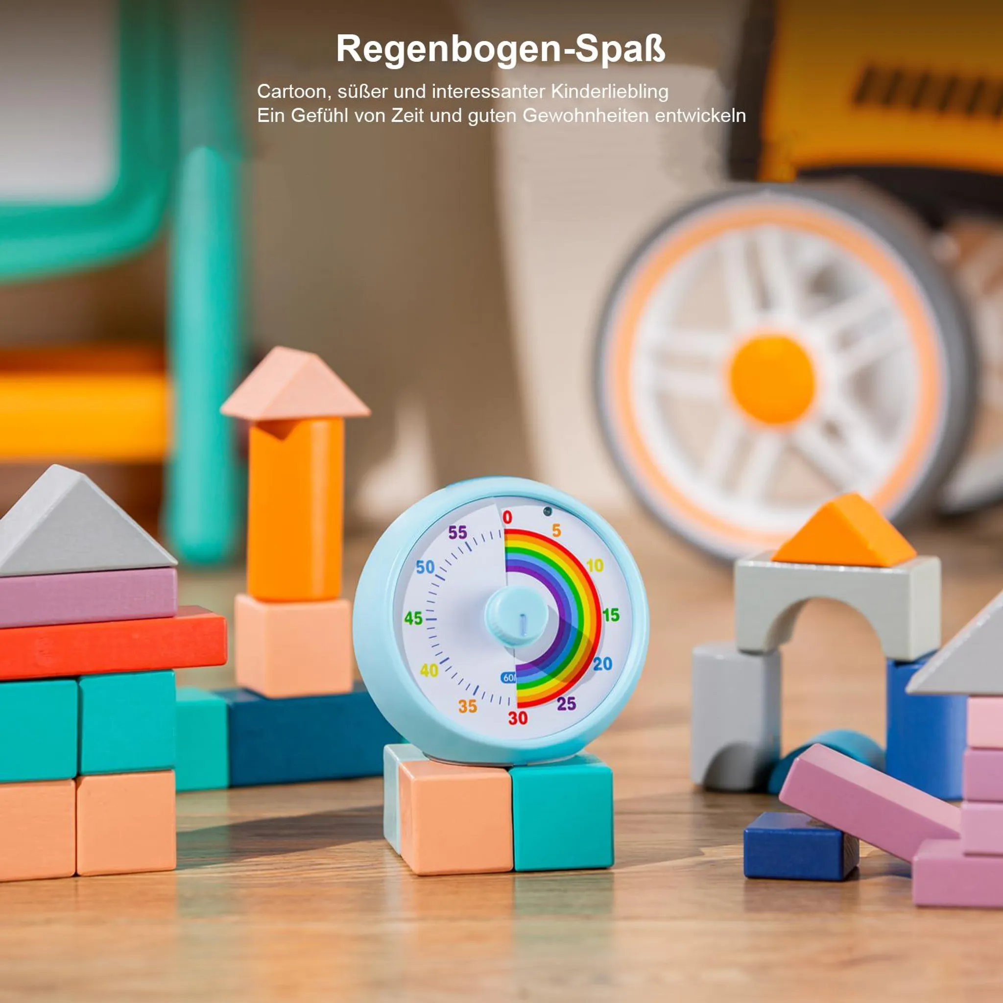 Bunte Bausteine und ein Regenbogen-Timer auf einem Holztisch.
