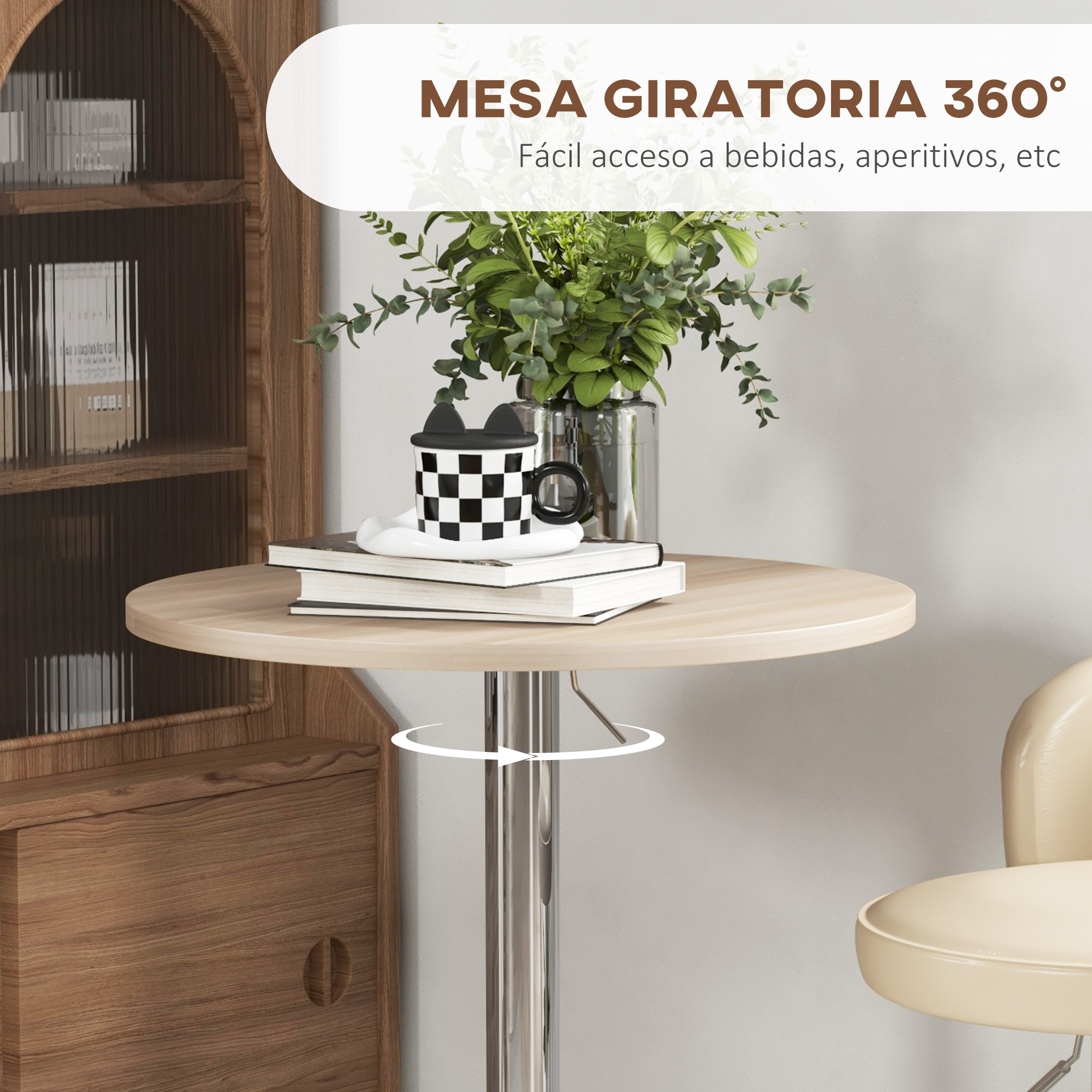 Una mesa redonda con una taza blanco y negro, libros y plantas verdes.