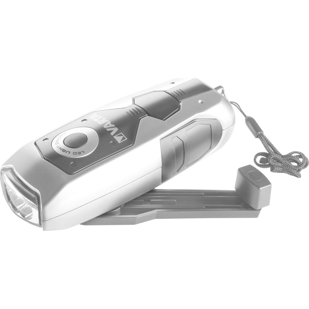 Lampe torche LED Varta argentée avec socle de chargement et cordon. Fond blanc.