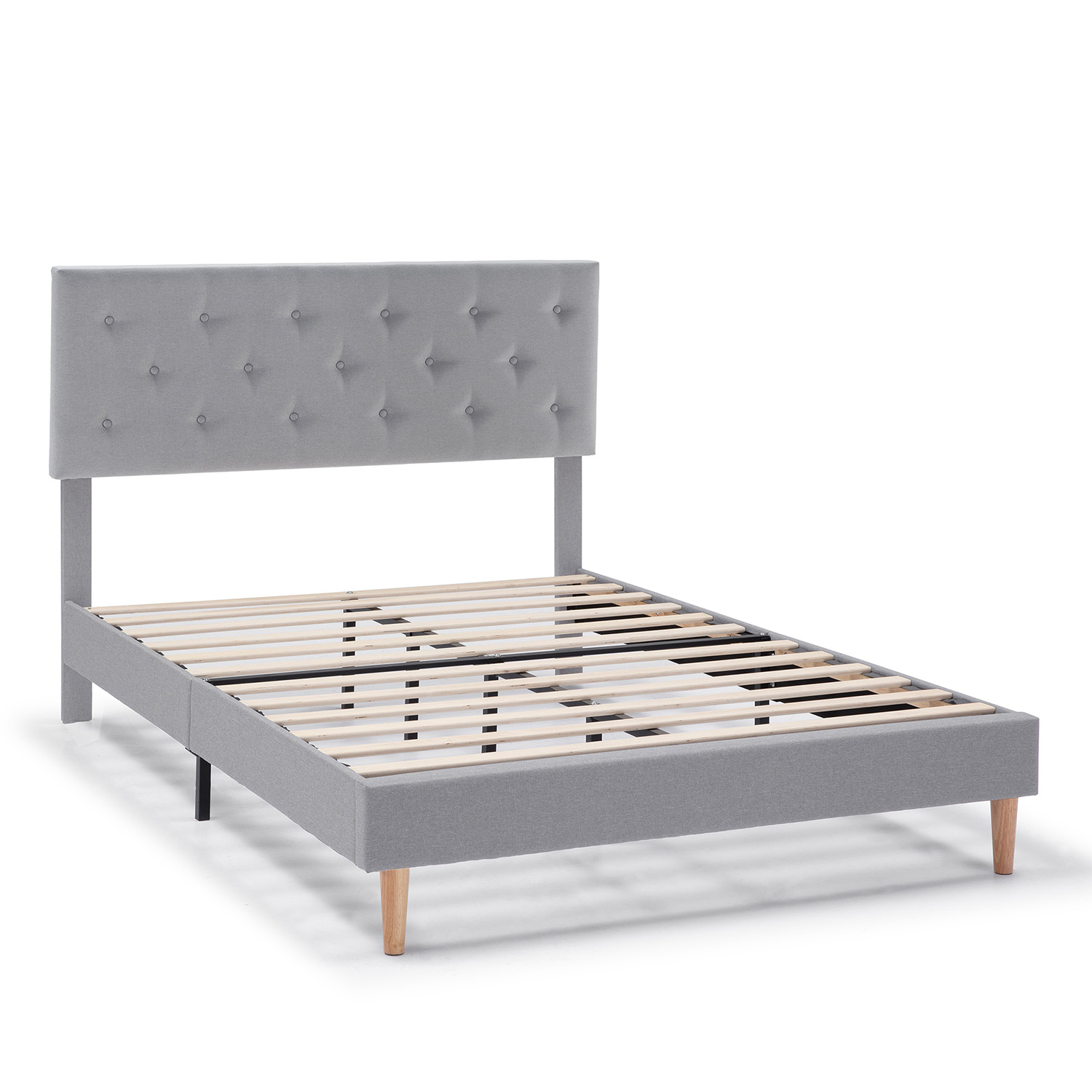 Estructura de cama gris de tela con botones y listones de madera, sobre cuatro patas.