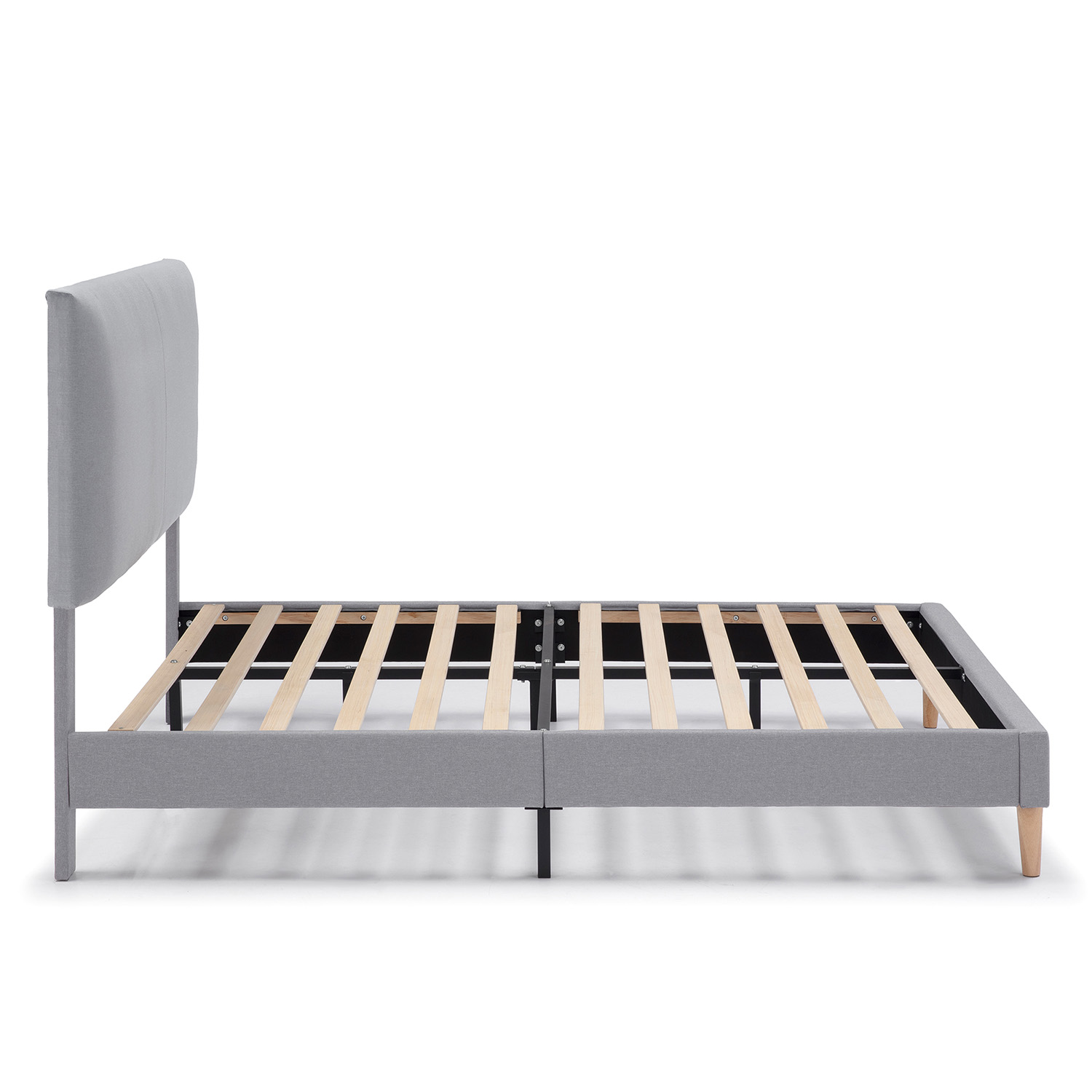 Estructura de cama de tela gris con somier y cabecero alto.