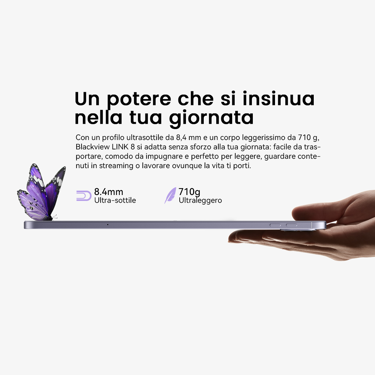 Una farfalla viola è su un tablet sottile tenuto da una mano.