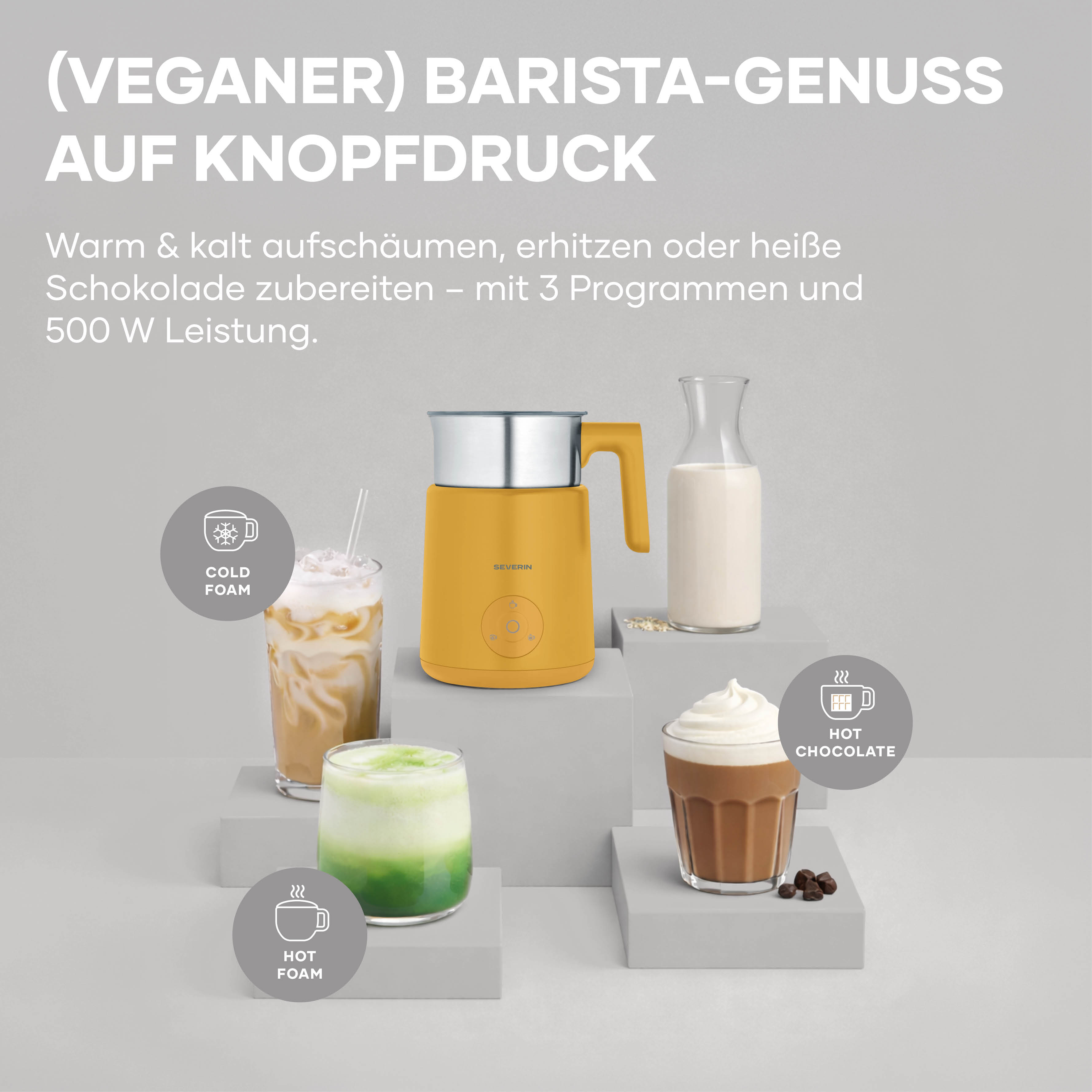 Ein gelber Milchaufschäumer mit drei Getränken: kalt, heiß und Kakao.