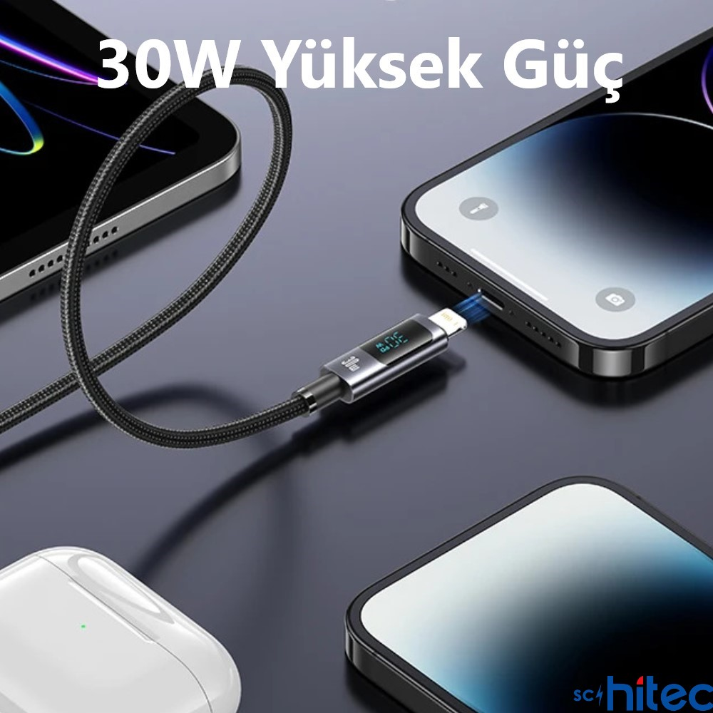 Dijital ekranlı siyah şarj kablosu bir akıllı telefona bağlanır.