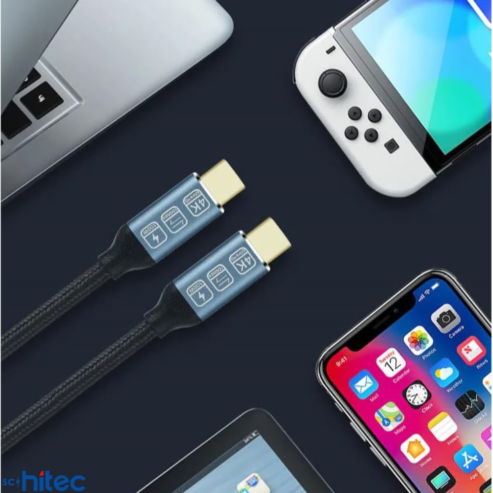 Dizüstü bilgisayar, telefon ve oyun konsolu yakınında 4K ve 100W işaretli iki USB-C kablosu.