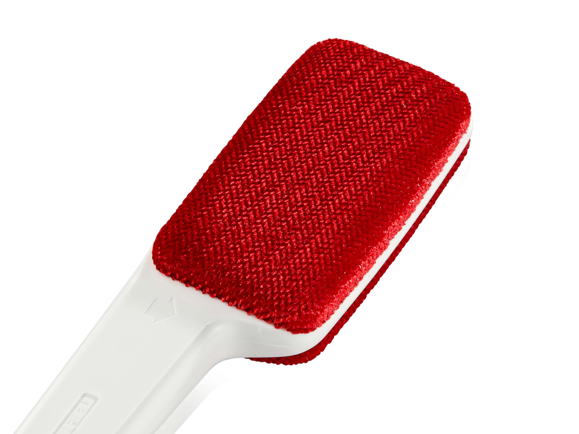 Ein roter Fusselentferner mit weißem Griff, isoliert auf weißem Hintergrund.