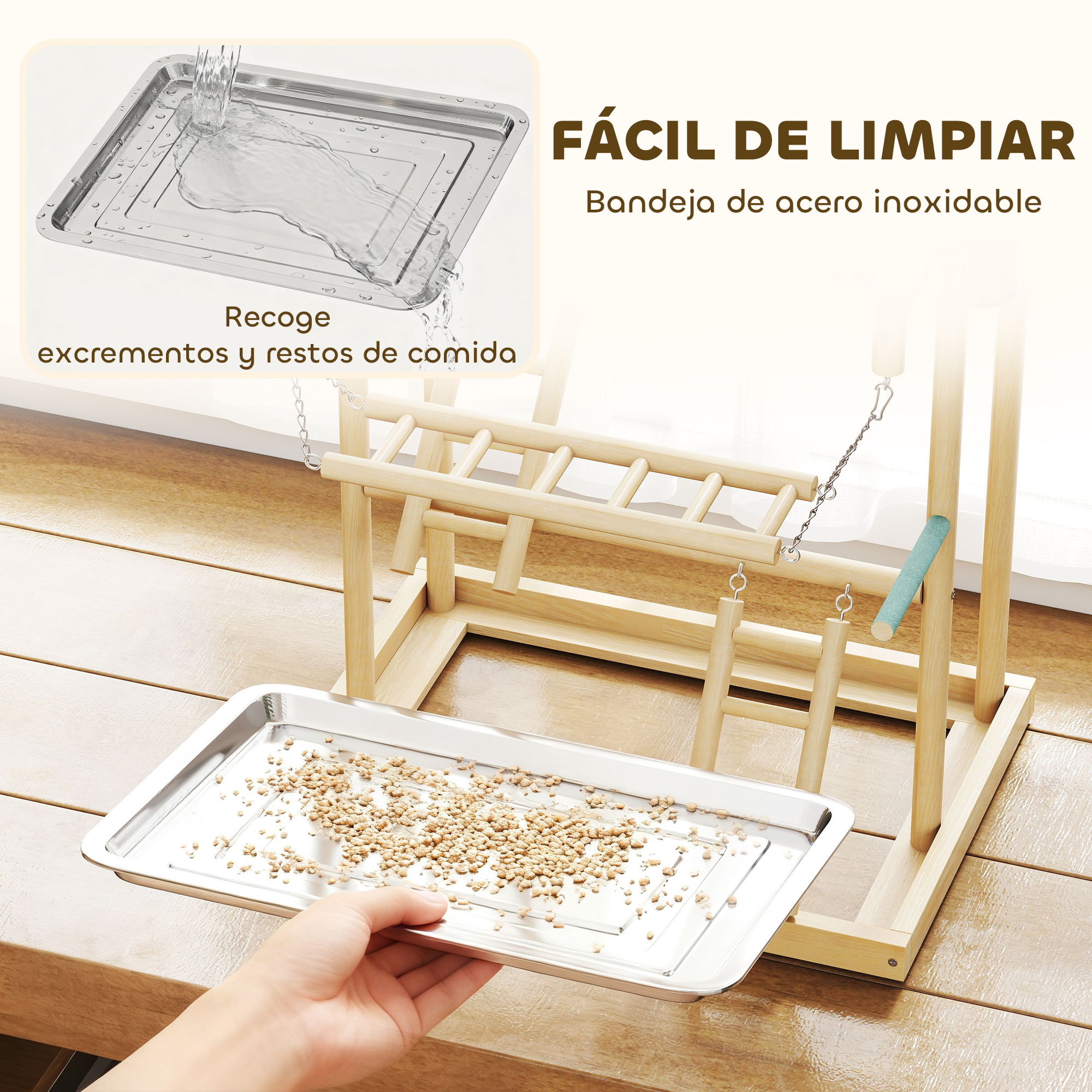 Una bandeja de acero inoxidable con alpiste está sobre un suelo de madera cerca de un soporte para pájaros.